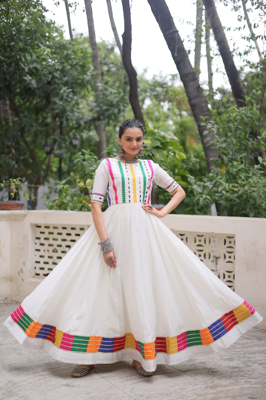 Prazu Fashion White Roman Silk Multicolor Thread And Mirror Work Navratri Gown