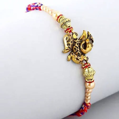 Ganesha Rakhi & Cadbury Silk In Best Bro Sleeve