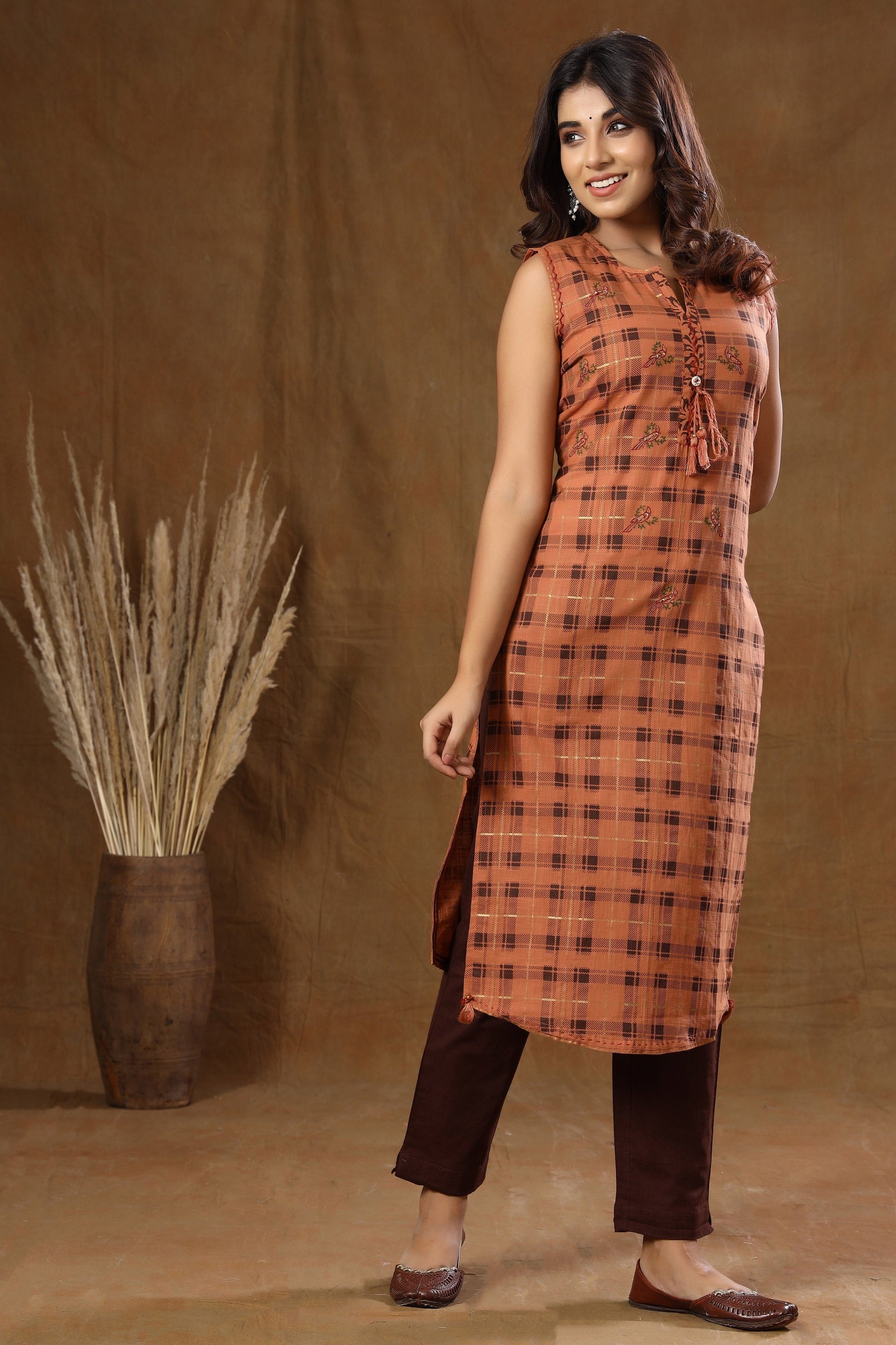 Kaajh Women's Brown Sleeveless Printed Kurta Pant Set