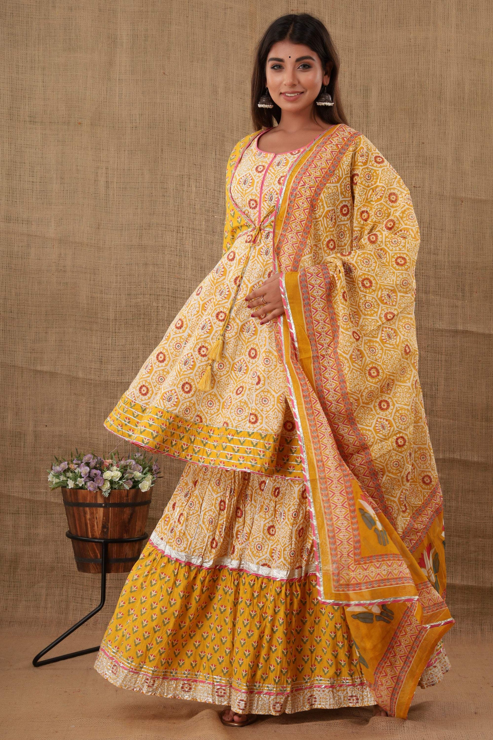 Kaajh Women's Yellow Embellishment Printed Suit Set