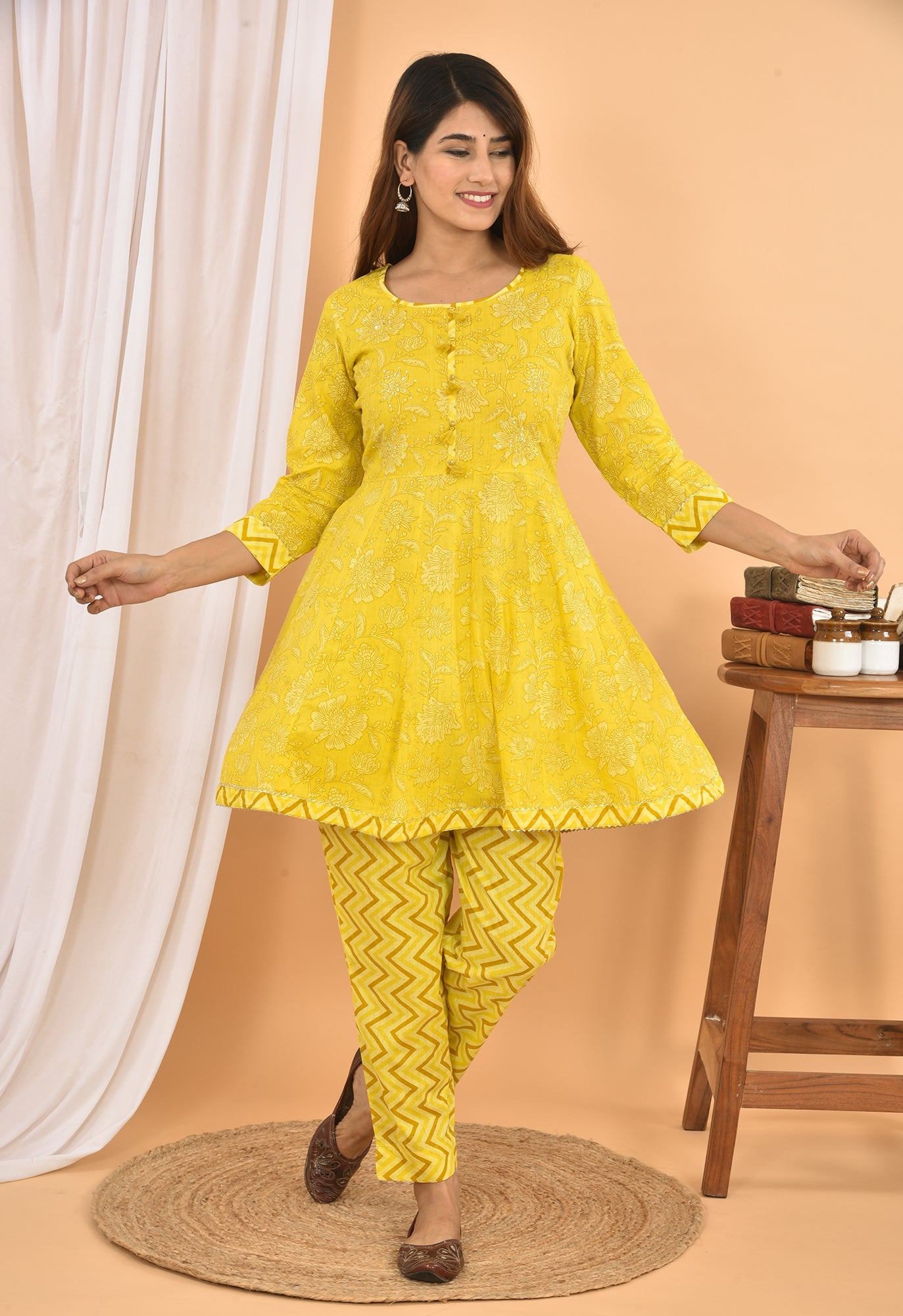 Kaajh Women's Yellow Floral Printed Mini Kurta Pant Set