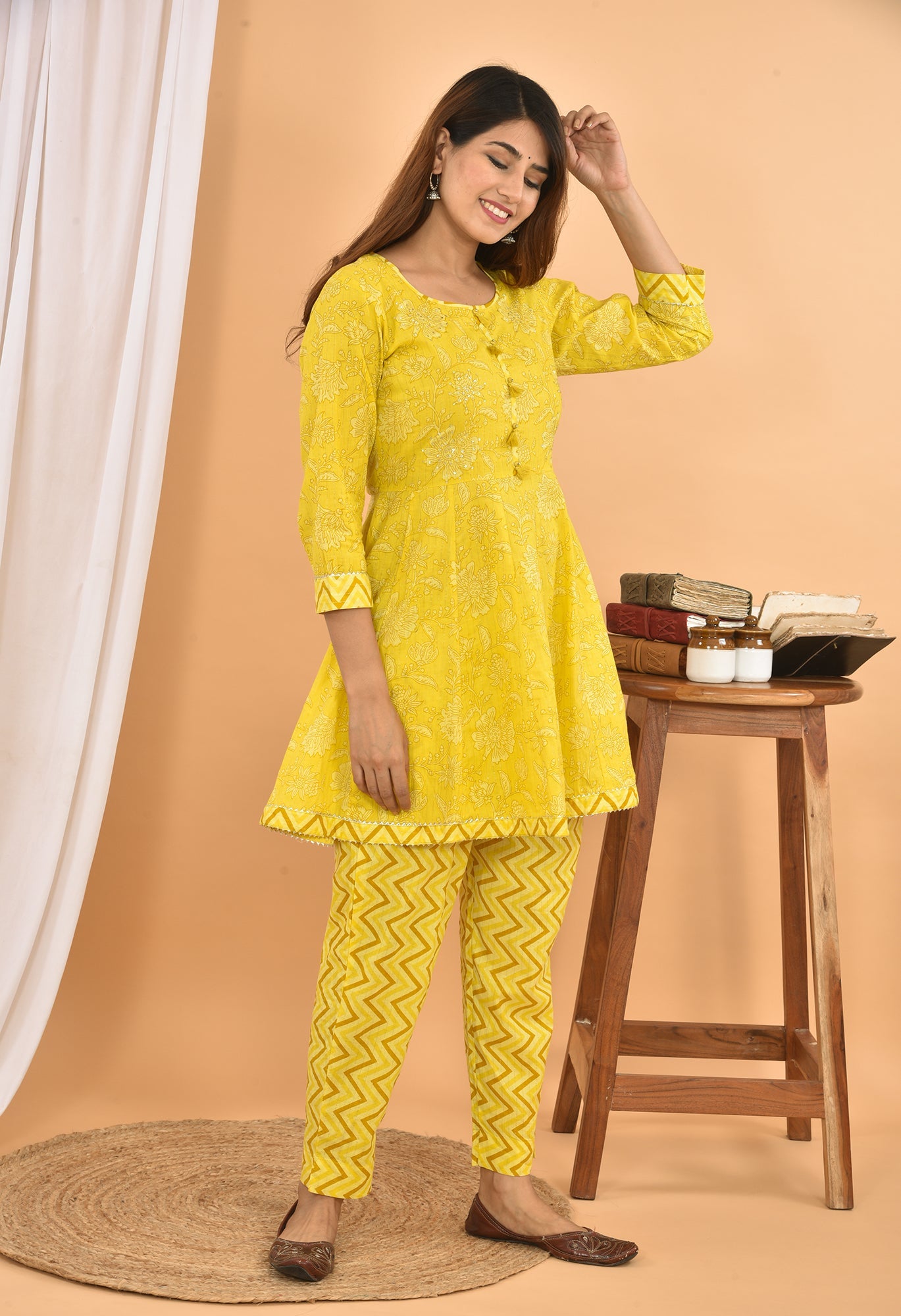 Kaajh Women's Yellow Floral Printed Mini Kurta Pant Set
