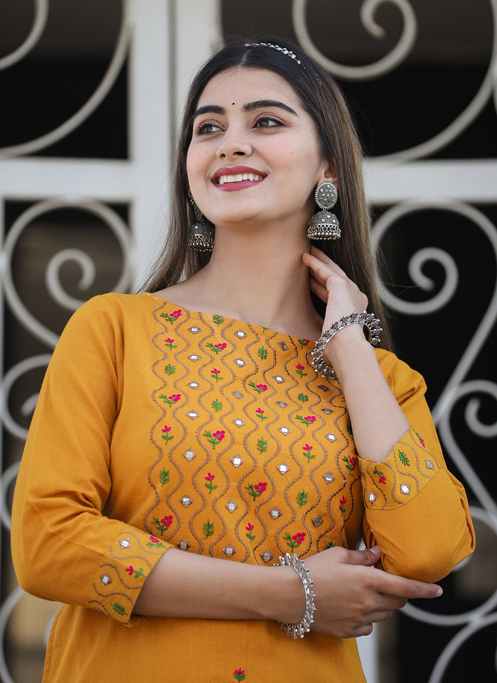Kaajh Women's Yellow Embroidered Cotton Kurta Pant Set