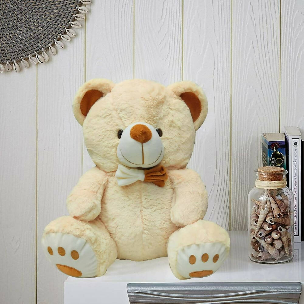 Webby Plush Cute Sitting Teddy Bear Soft Toys with Neck Bow and Foot Print (Beige)  Grab2Buy Generic Grab2Buy