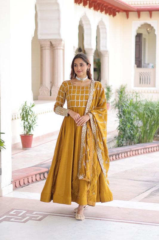 Prazu Fashion Mustard Vichitra Silk Rich Sequins & Zari Embroidered Gown With Dupatta