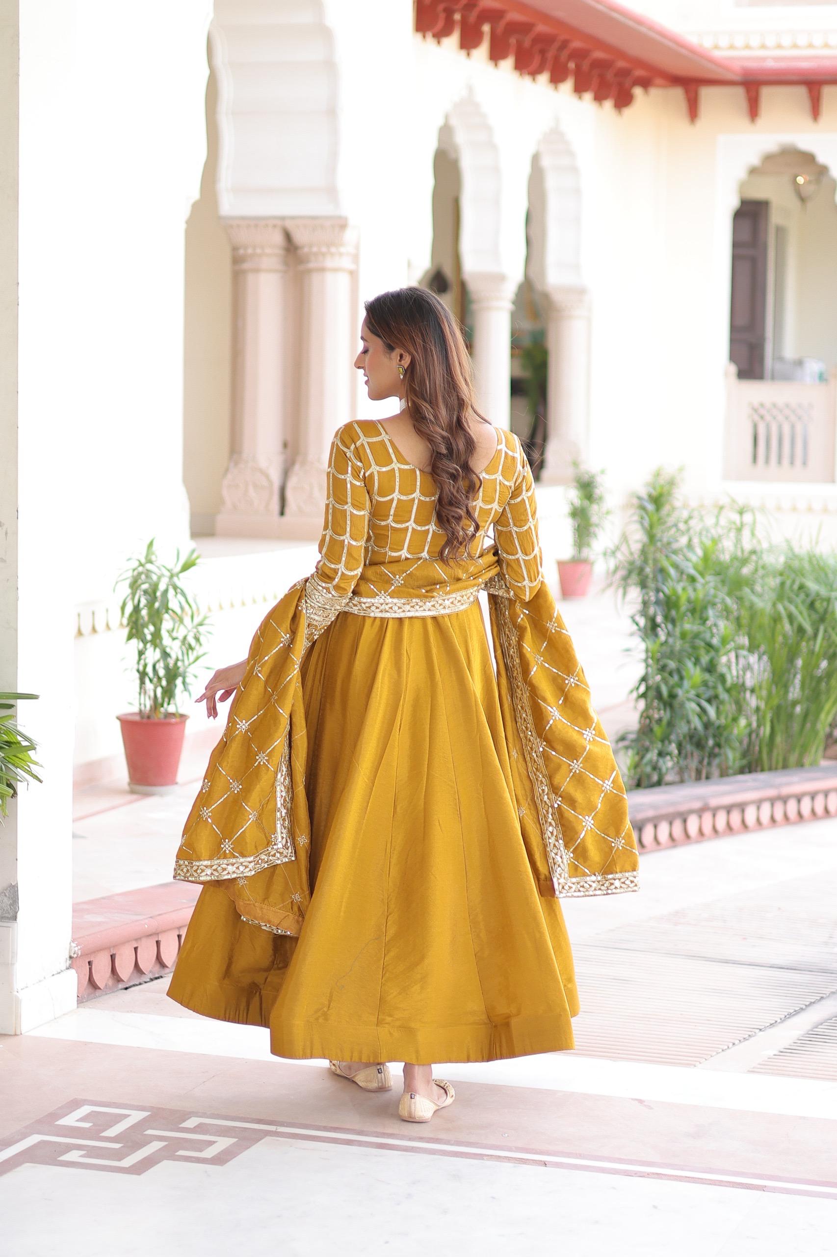 Prazu Fashion Mustard Vichitra Silk Rich Sequins & Zari Embroidered Gown With Dupatta