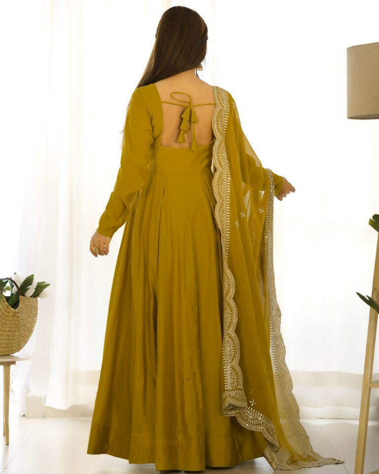 Teeya Creation Mustard Color Pure Roman Silk Chanderi Party Wear Fully Stitched Gown