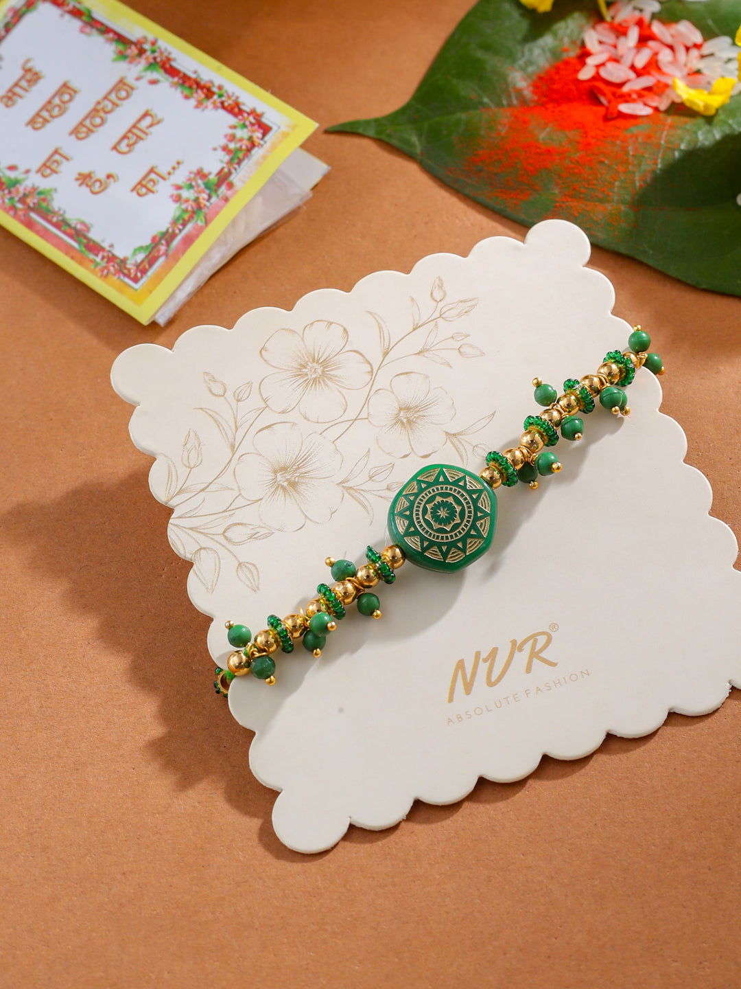 NVR Men Green Artificial Beads Round Shape Thread Rakhi with Roli Chawal Chandan & Mishri | Grab2Buy