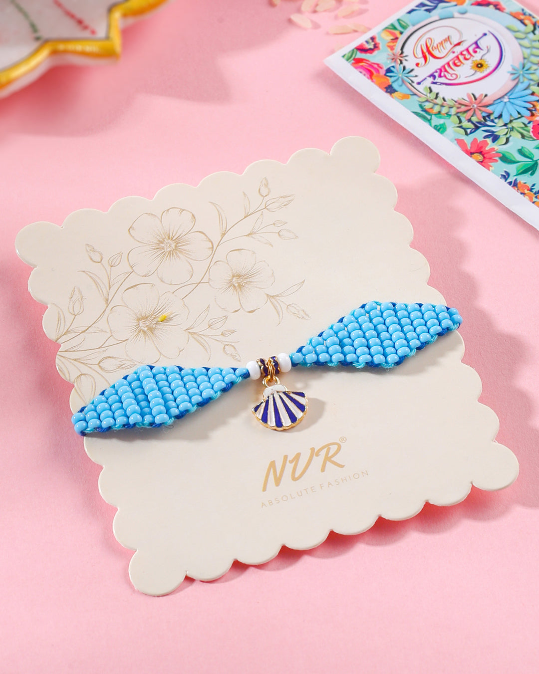 NVR Men Blue Pearls Unique Design Thread Rakhi with Roli Chawal Chandan & Mishri | Grab2Buy