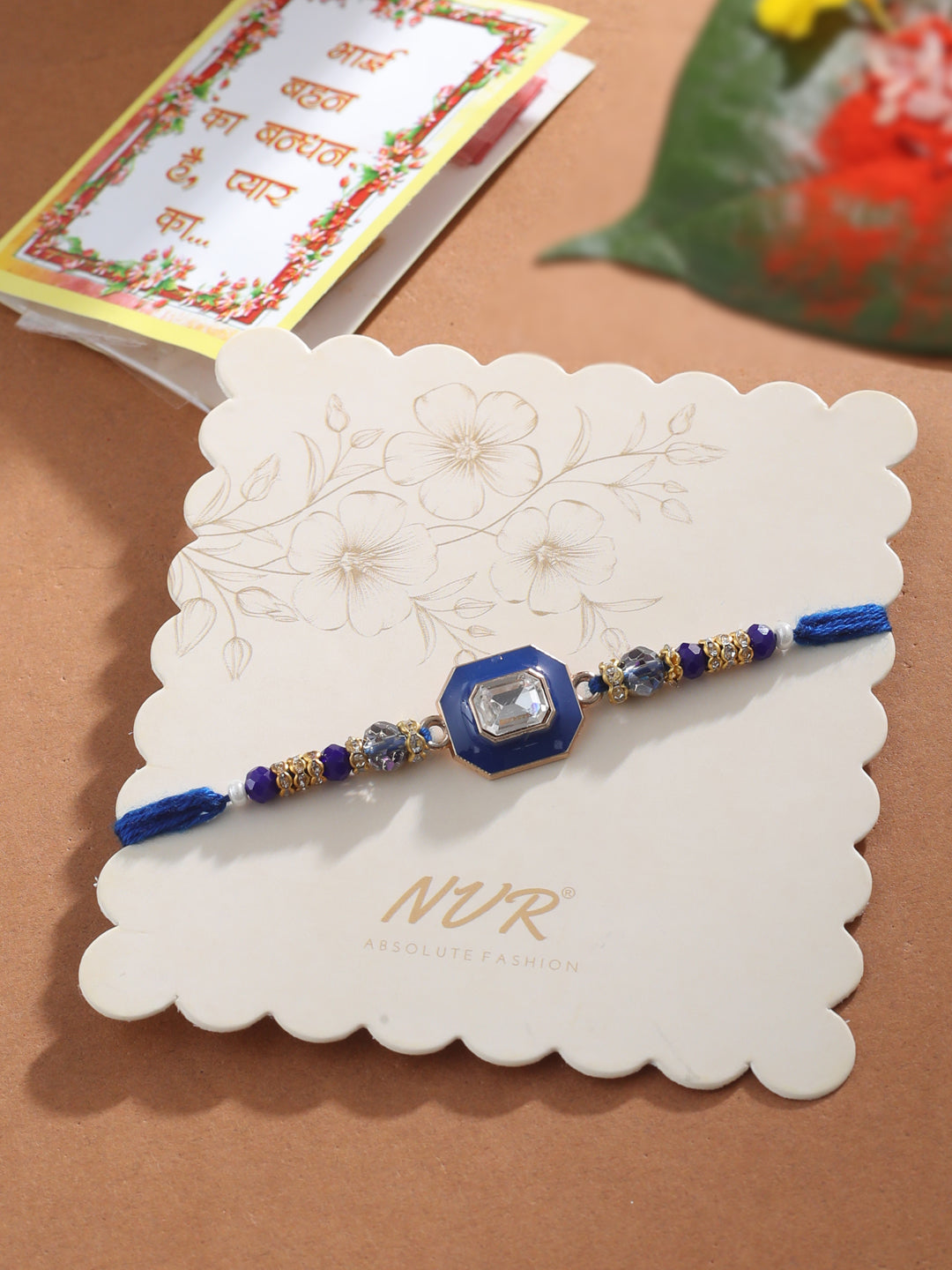 NVR Men Blue Artificial Stones Handmade Thread Rakhi with Roli Chawal Chandan & Mishri | Grab2Buy