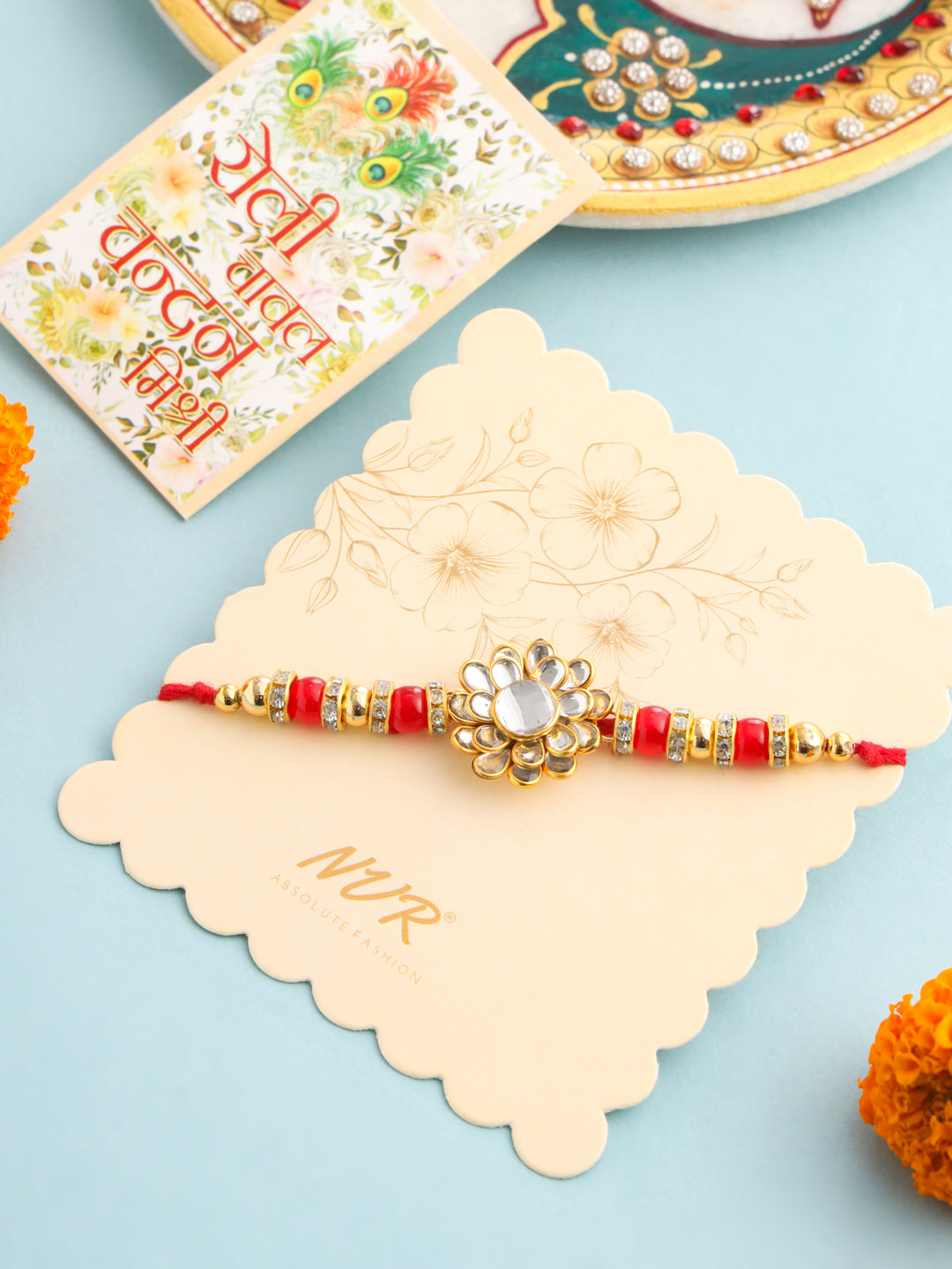 NVR Men Red Kundan Studded Floral Design Thread Rakhi with Roli Chawal Chandan & Mishri | Grab2Buy