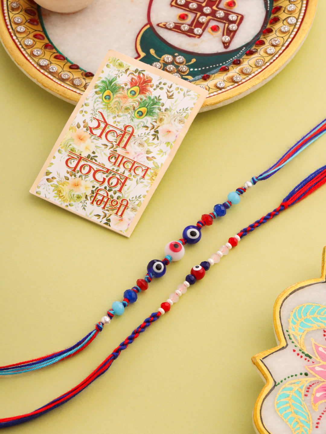 NVR Men Multicolor Evil Eye Artificial Beads Thread Rakhi with Roli Chawal Chandan & Mishri | Grab2Buy