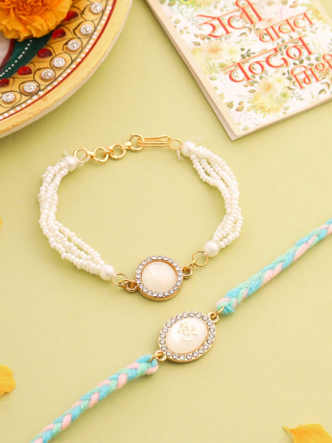NVR Set of 2 White Pearls & Artificial Beads Bhaiya Bhabhi Rakhi with Roli Chawal Chandan & Mishri | Grab2Buy