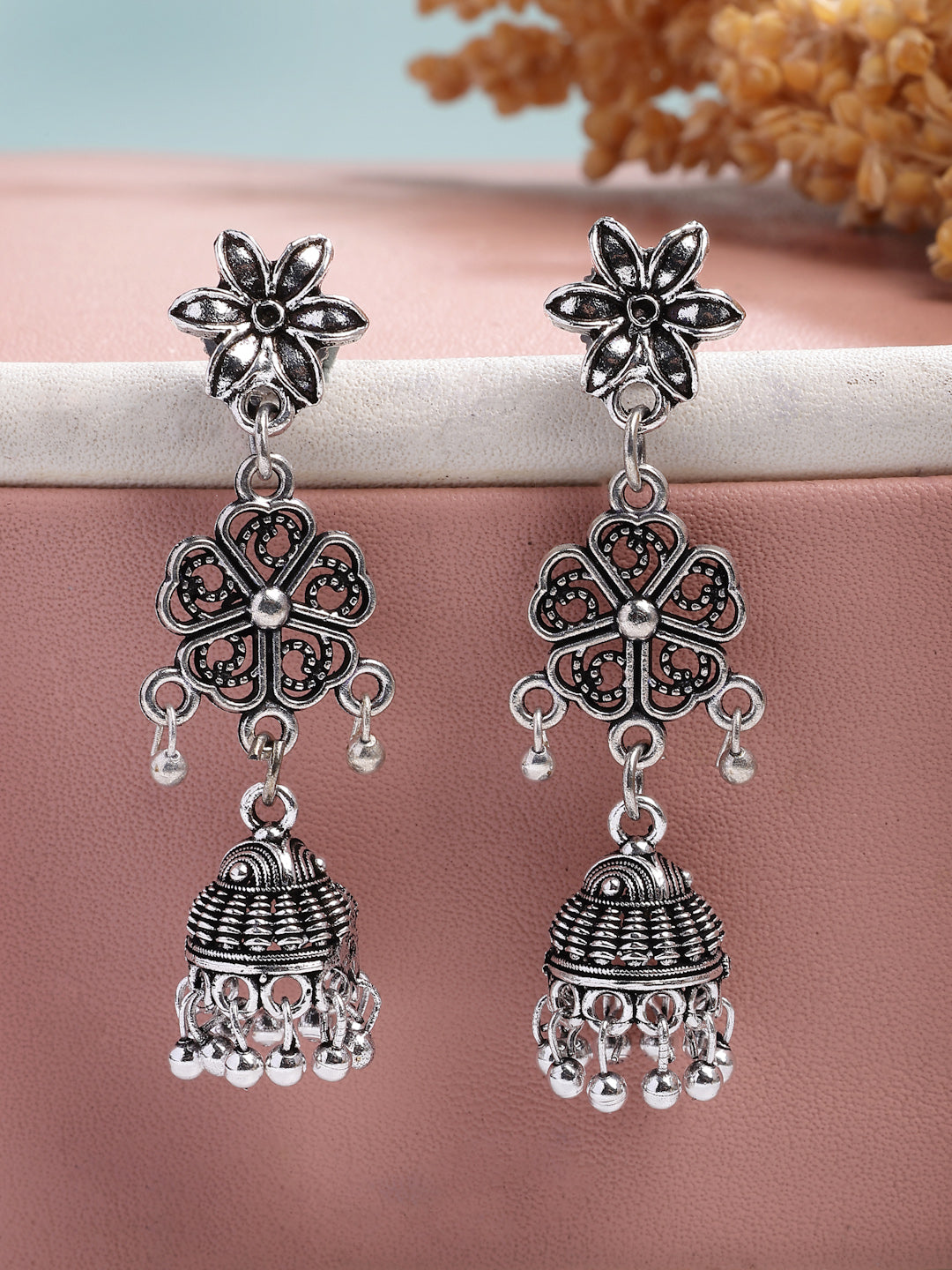 NVR Women Silver Toned Oxidized Floral Design Jhumka Earrings NR Retail-NVR