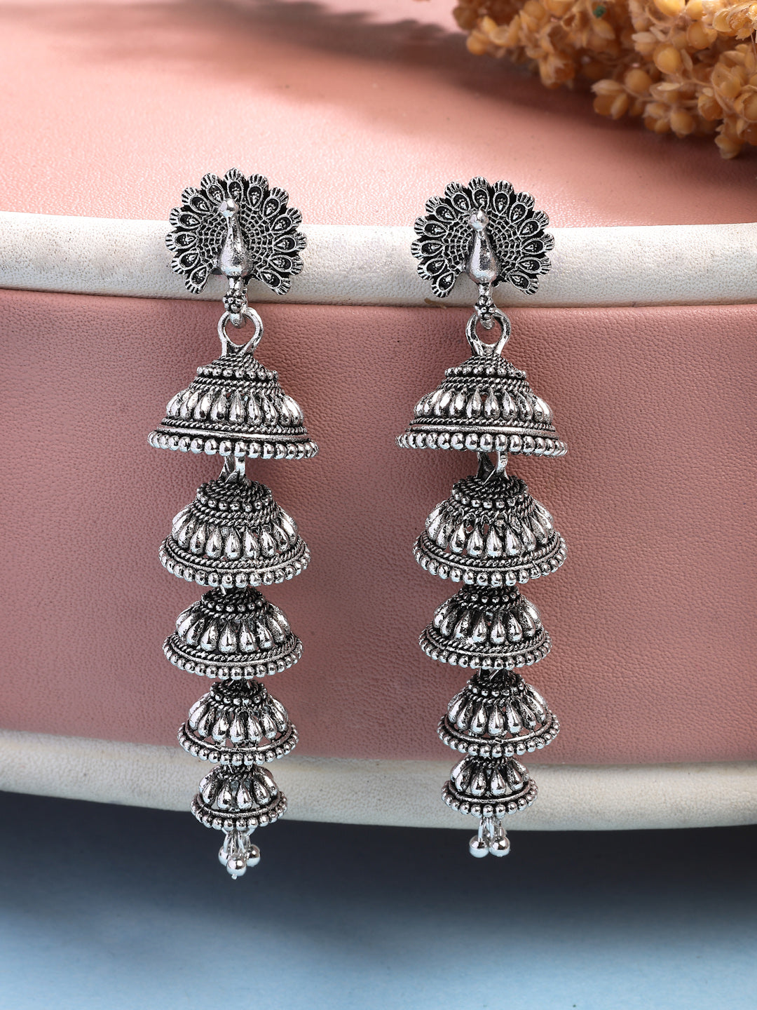 NVR Women Silver Plated Oxidized Peacock Design Layered Jhumka Earrings - Swadesiicart