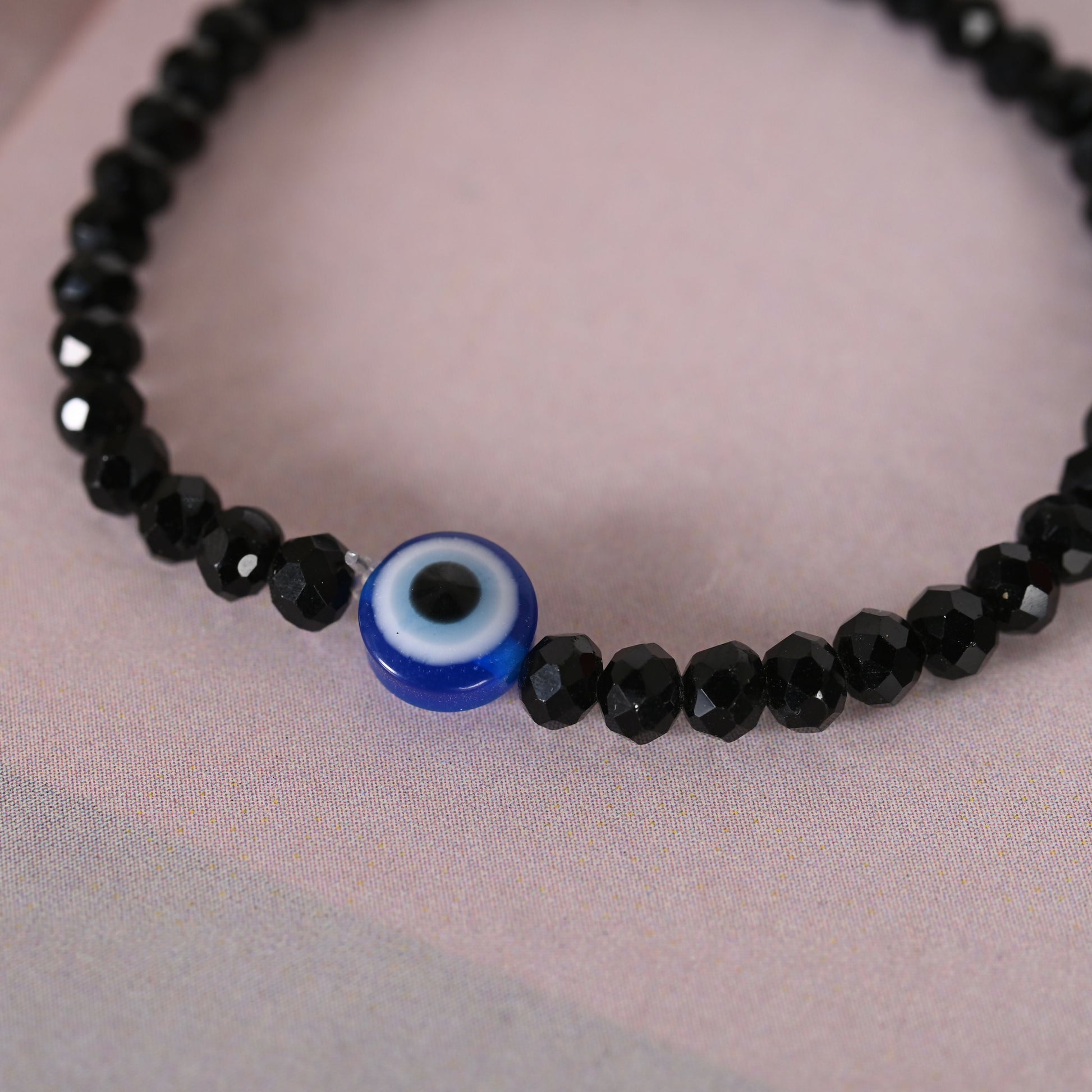 NVR Men & Women Black Evil Eye Crystal Elasticated Bracelet | Grab2Buy