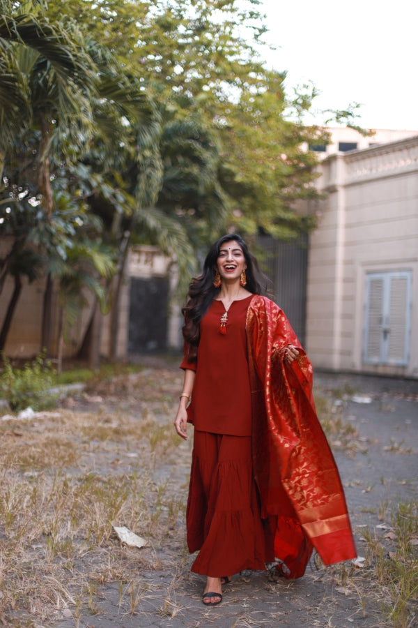 Jompers Women Maroon & Golden Solid Kurti with Sharara & Woven Design Dupatta