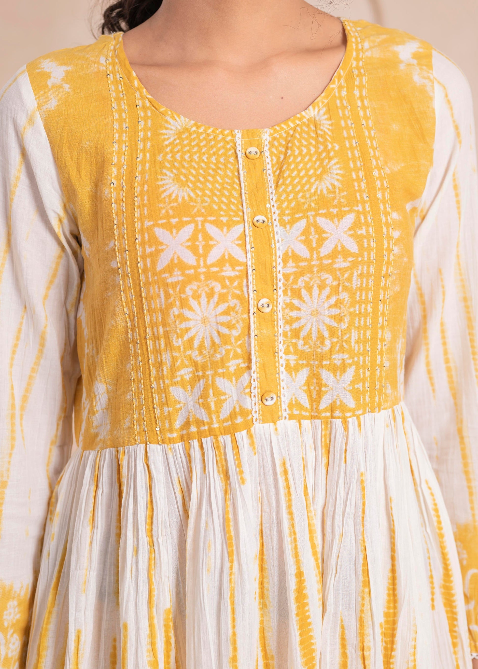 Juniper Mustered and white kurta , solid bottom and tie - dye dupatta with cotton lace , buttons , sequence