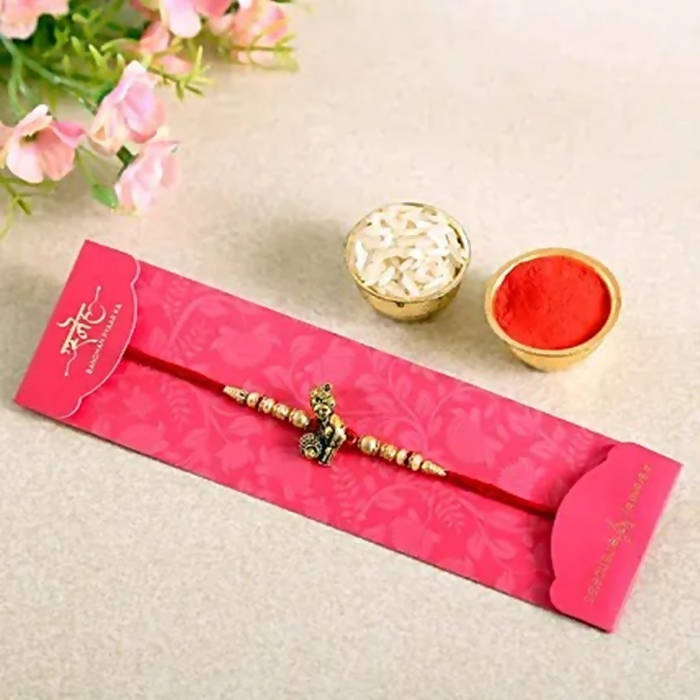 Divine Lord Krishna Pearl Rakhi & Cadbury Fruit N Nut