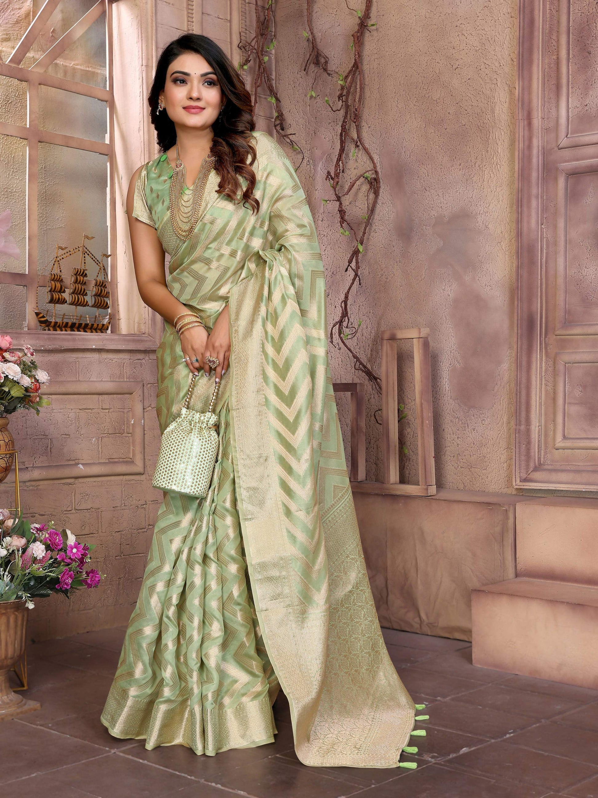 Aastha Fashion Pista Soft Organza Silk Weaving Saree