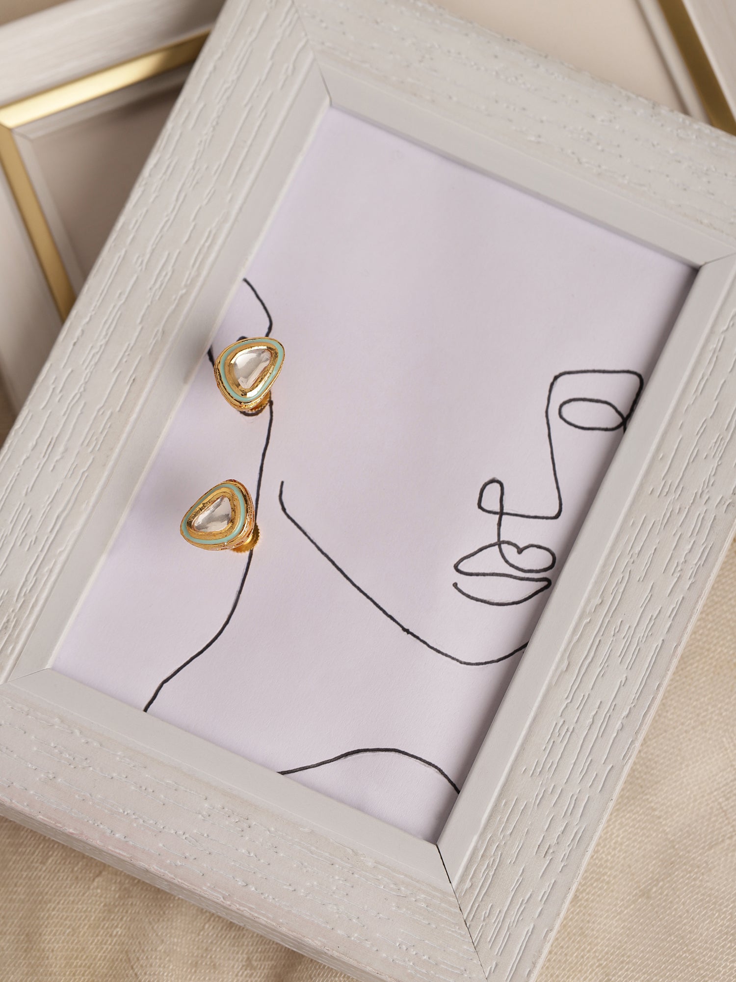 Gold-Plated Triangular Kundan Studded Studs Earrings - Ruby Raang - Grab2buy