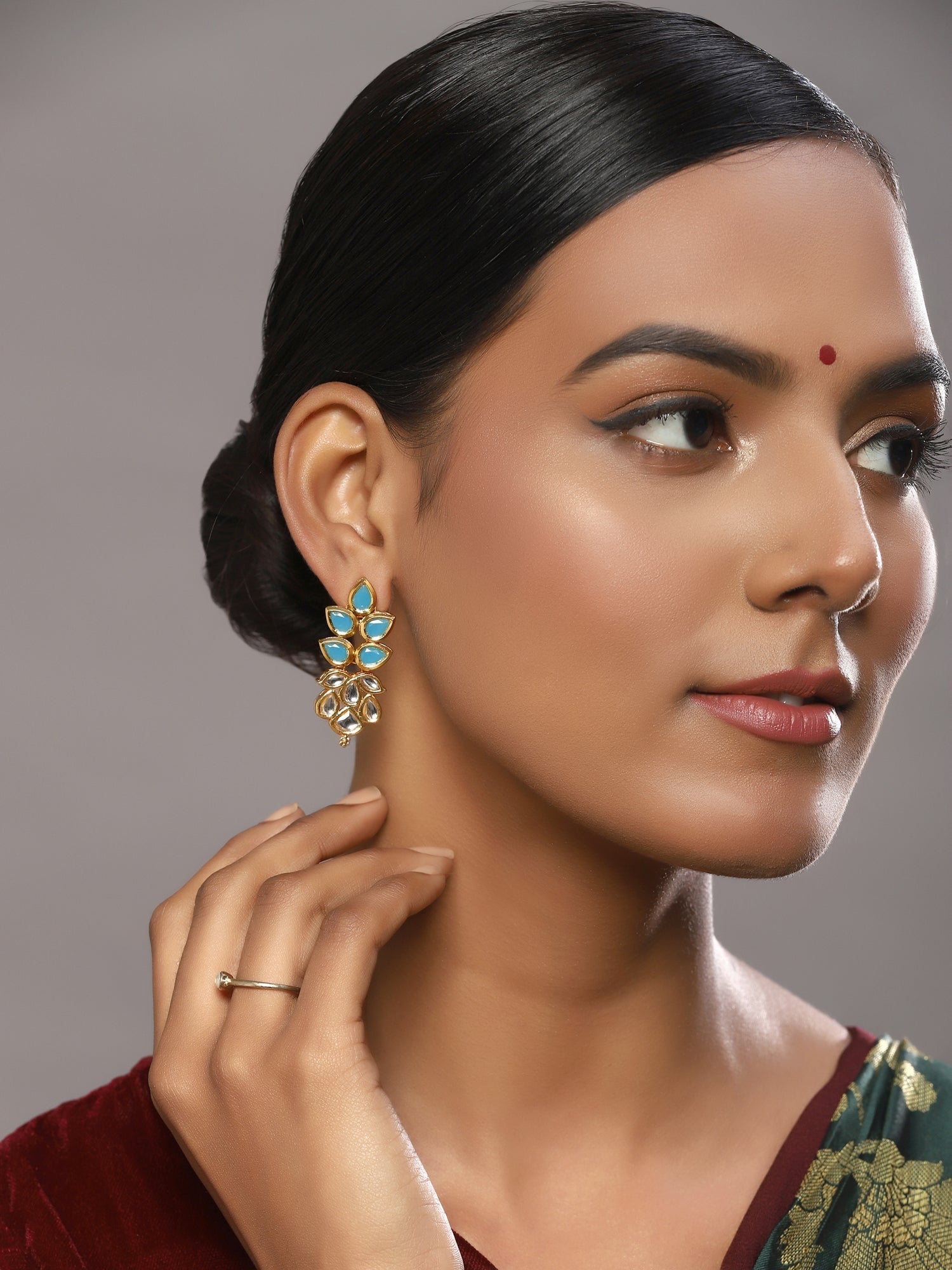 Gold-Toned Leaf Shaped Studs Earrings - Ruby Raang - Grab2buy