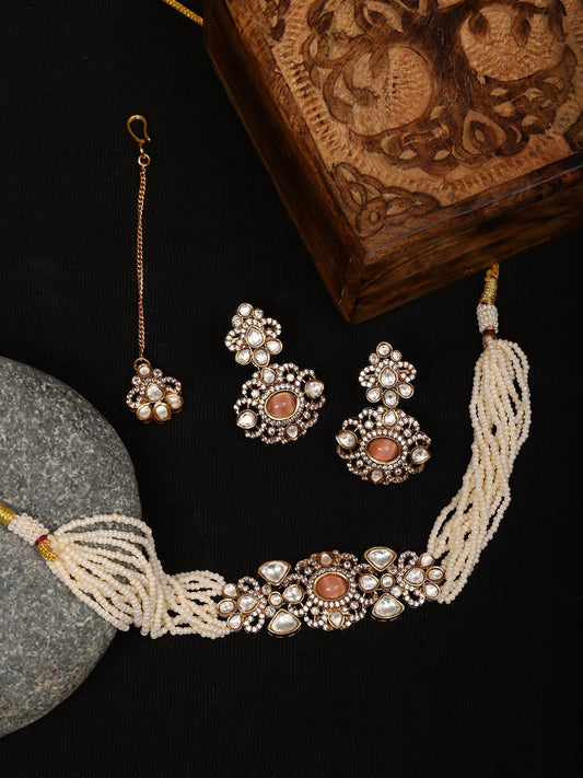 Stone and Mossainite Kundan in Pearls with Matching Earrings and Maang Tikka - Ruby Raang