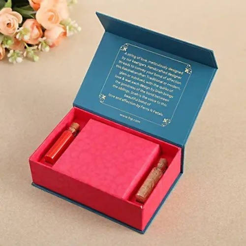 Om Golden Bracelet Rakhi & Kaju Rolls Box