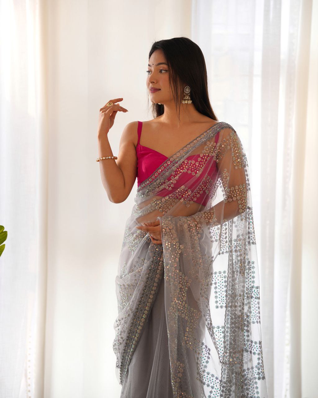 Teeya Creation Grey Color Butterfly Net Heavy Work Saree