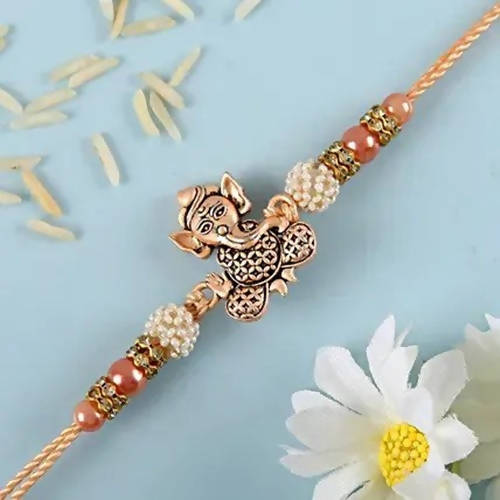 Holy Ganesha Rakhi & Ferrero Rocher Moments Pack