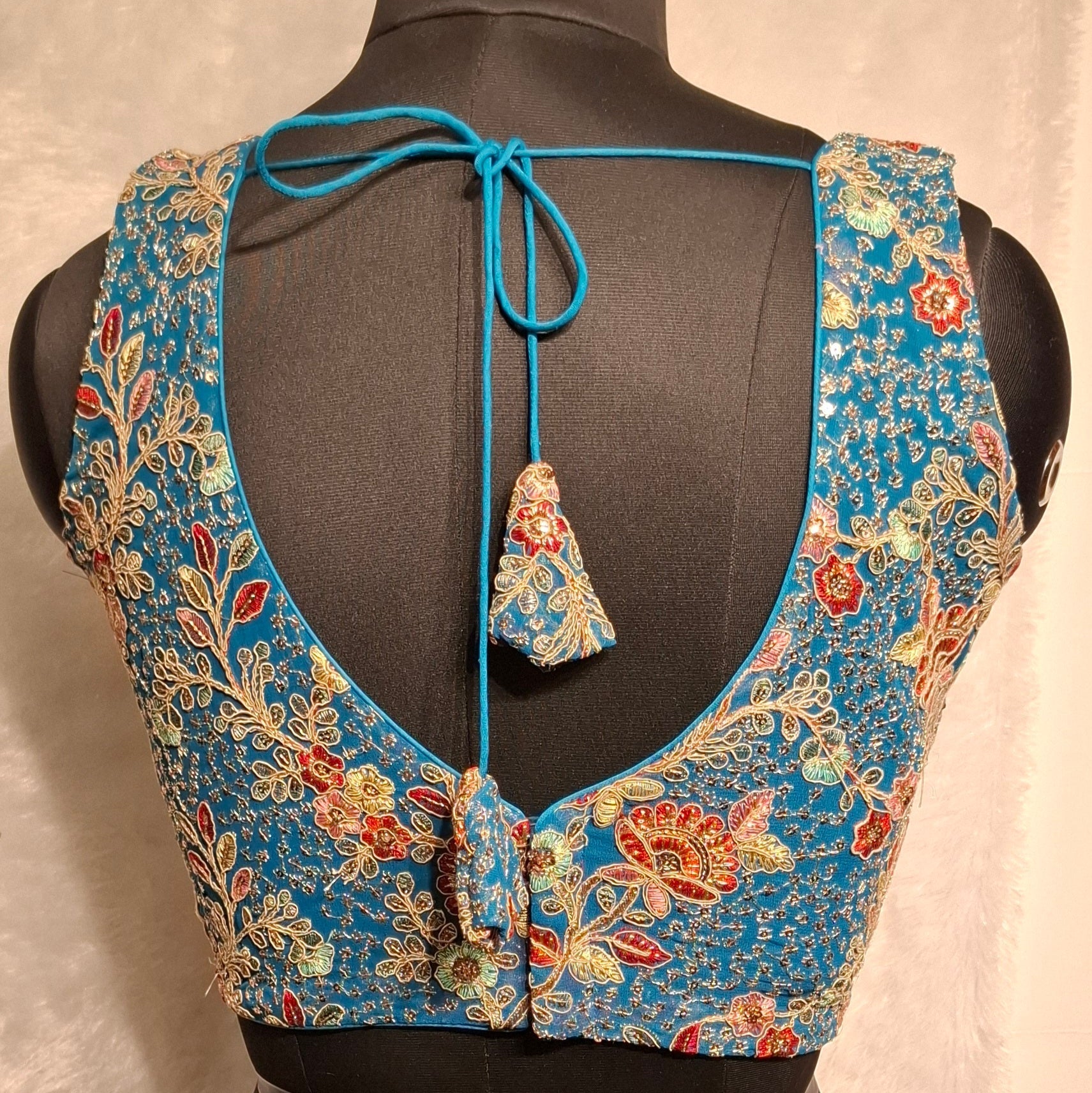 Kia Fashions Turquoise Blue Georgette Multi Color Emb & Sqn Readymade Blouse 