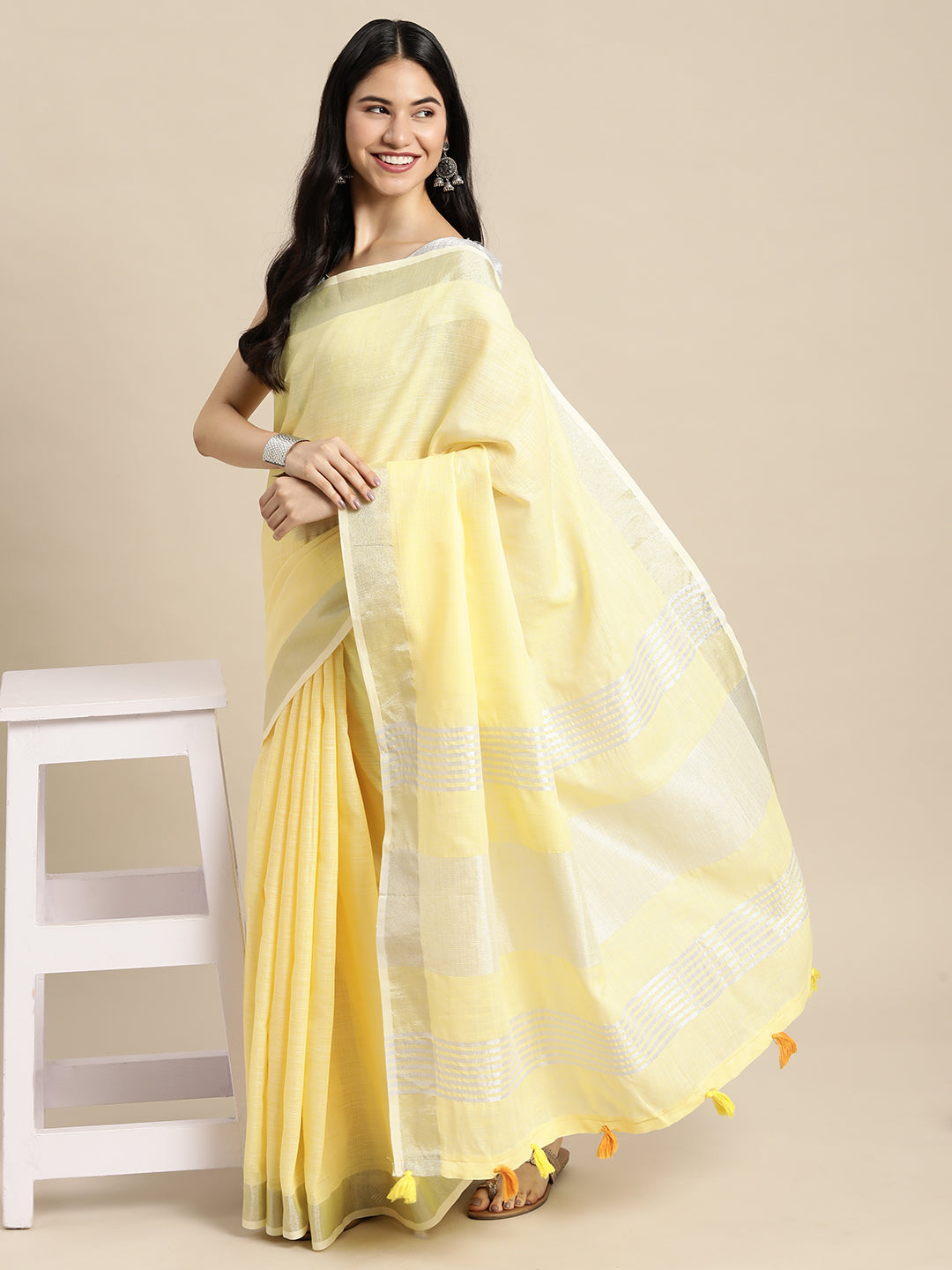 Shree Shyam Fashion Elegant Yellow Woven Linen Saree with Contrast Zari Border & Tassels - Soft & Breathable Party Wear