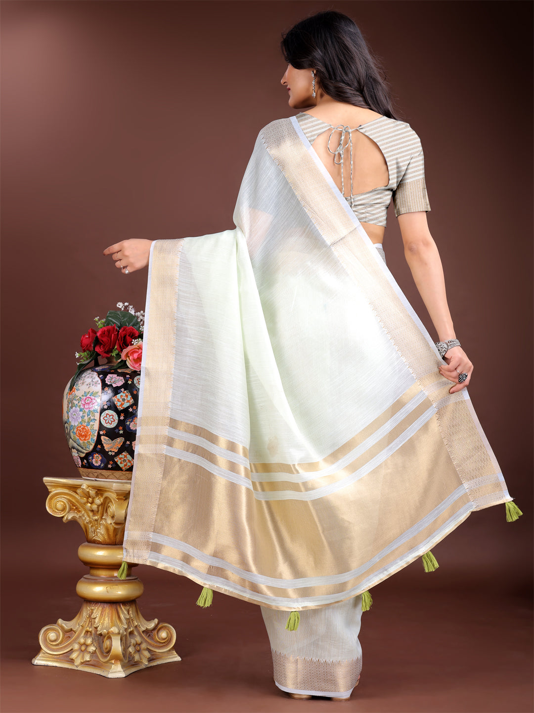 Shree Shyam Fashion Elegant Light Green Woven Linen Saree with Contrast Zari Border & Tassels - Soft & Breathable Party Wear