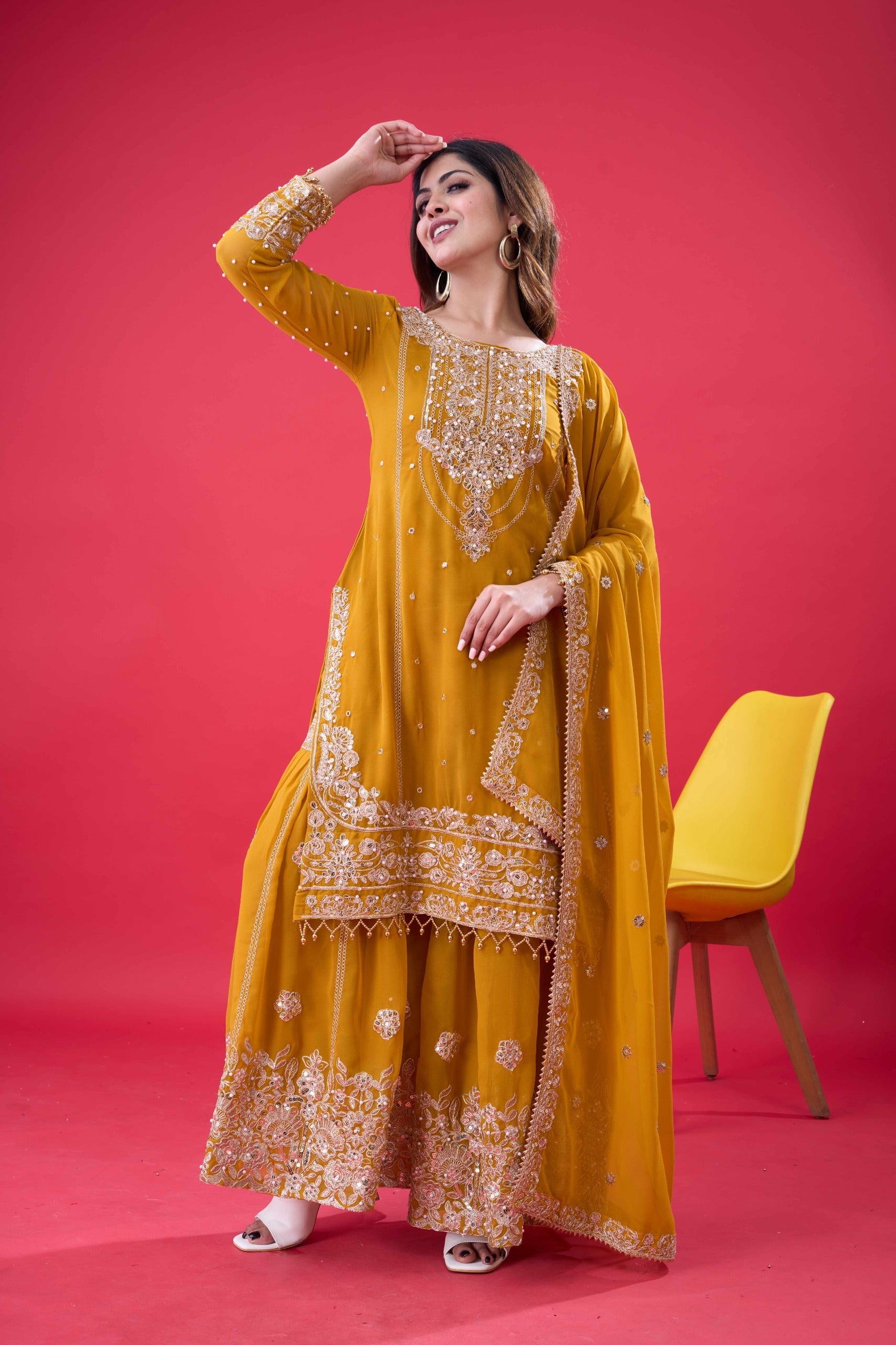 Prazu Fashion Yellow Georgette Embroidered Rivet Moti Work Palazzo Suit