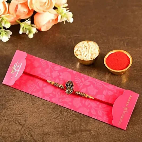 Serene Lord Krishna Rakhi & Cadbury Fruit N Nut