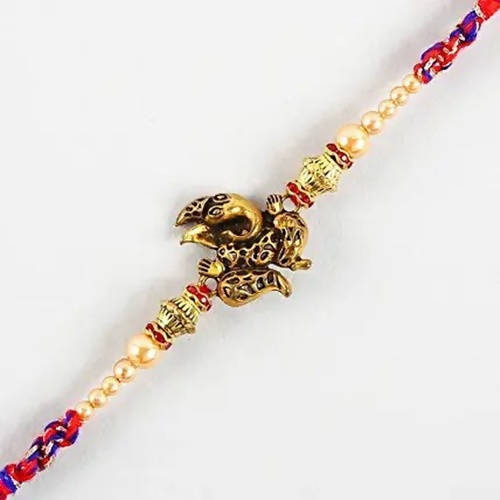 Ganesha Rakhi & Cadbury Silk In Best Bro Sleeve