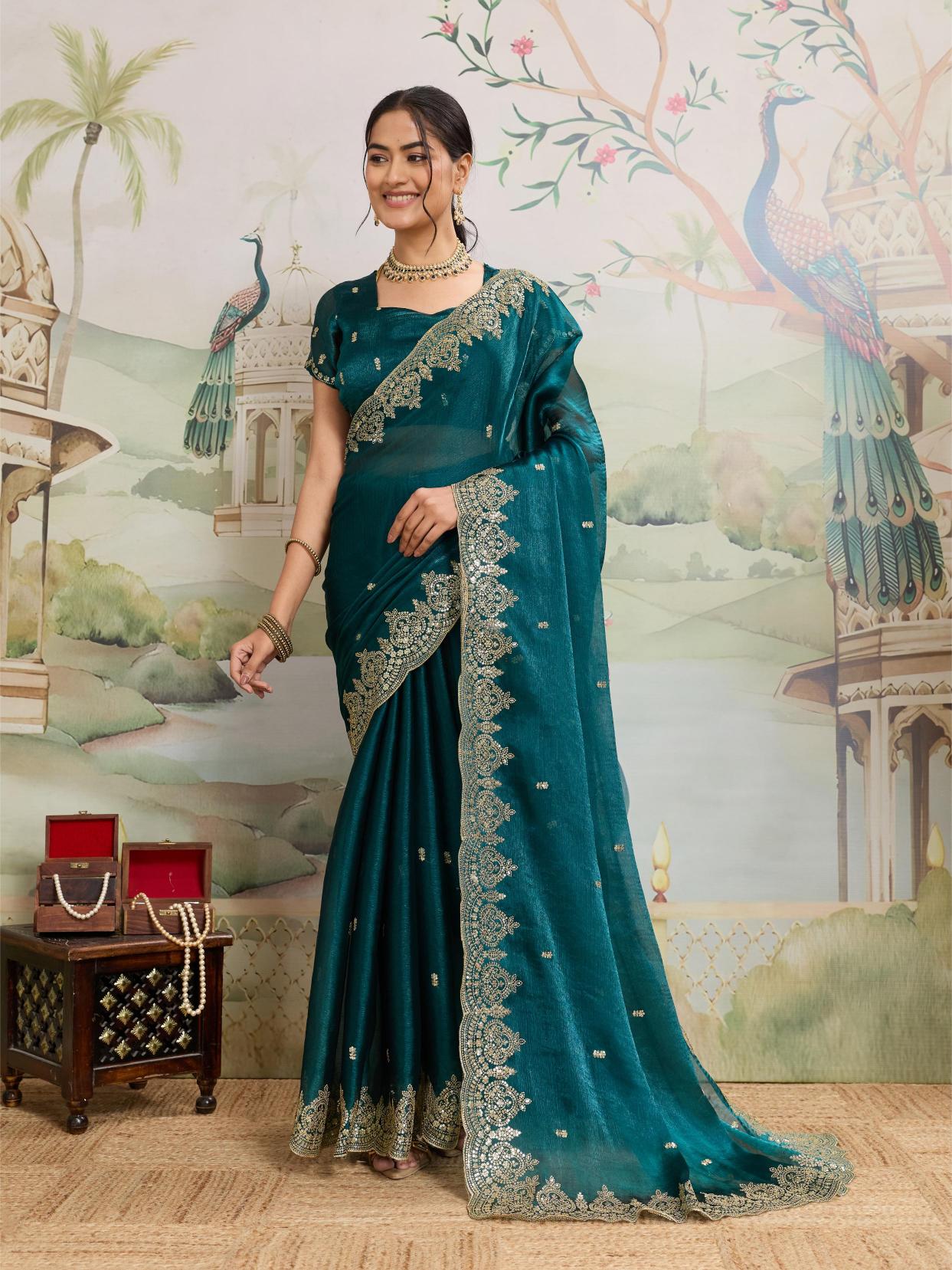 Dwija Fashion Teal Blue Party Wear Embroidered Jimmy Choo Organza Saree With Unstitched Blouse