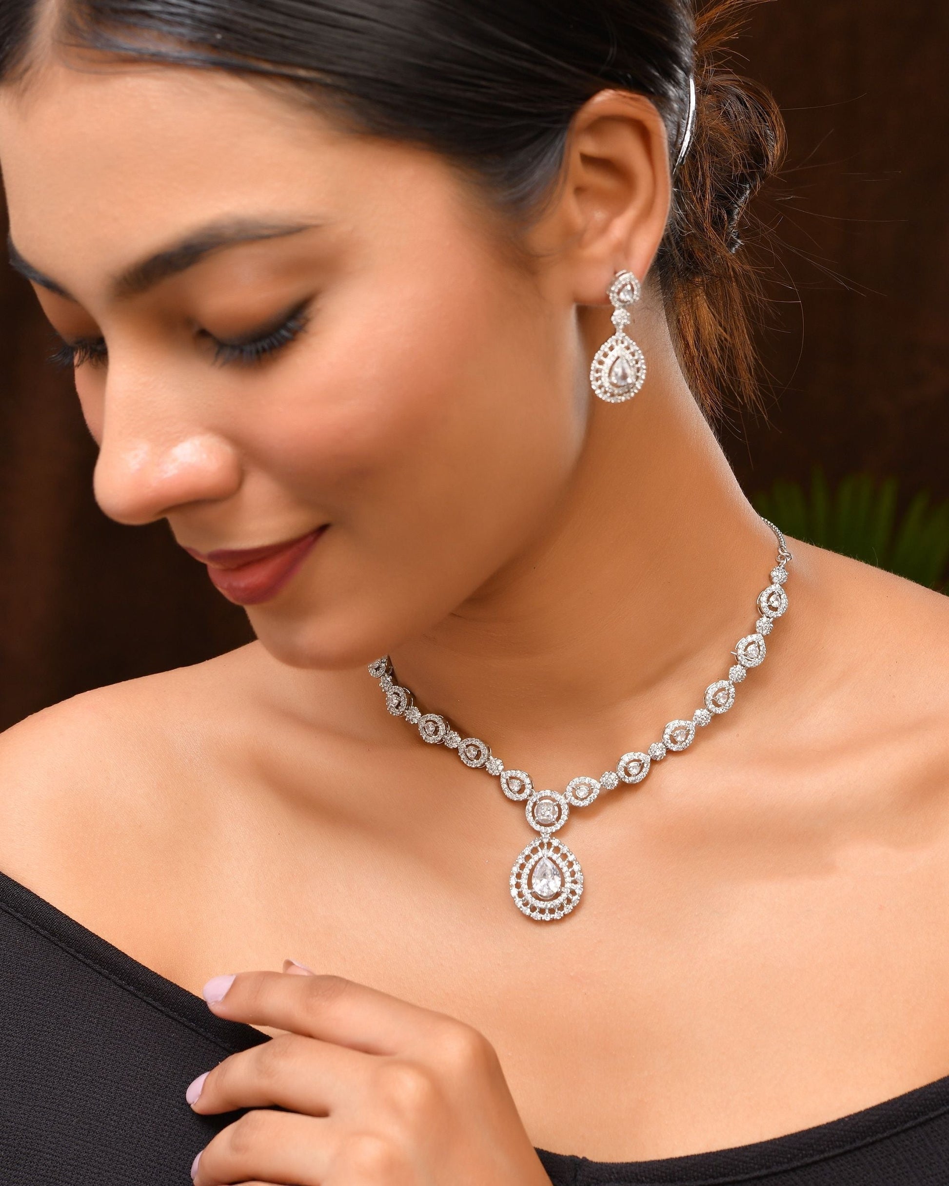 VOJ Silver Plated AD Stone Studded Elegant Necklace And Earrings Set 