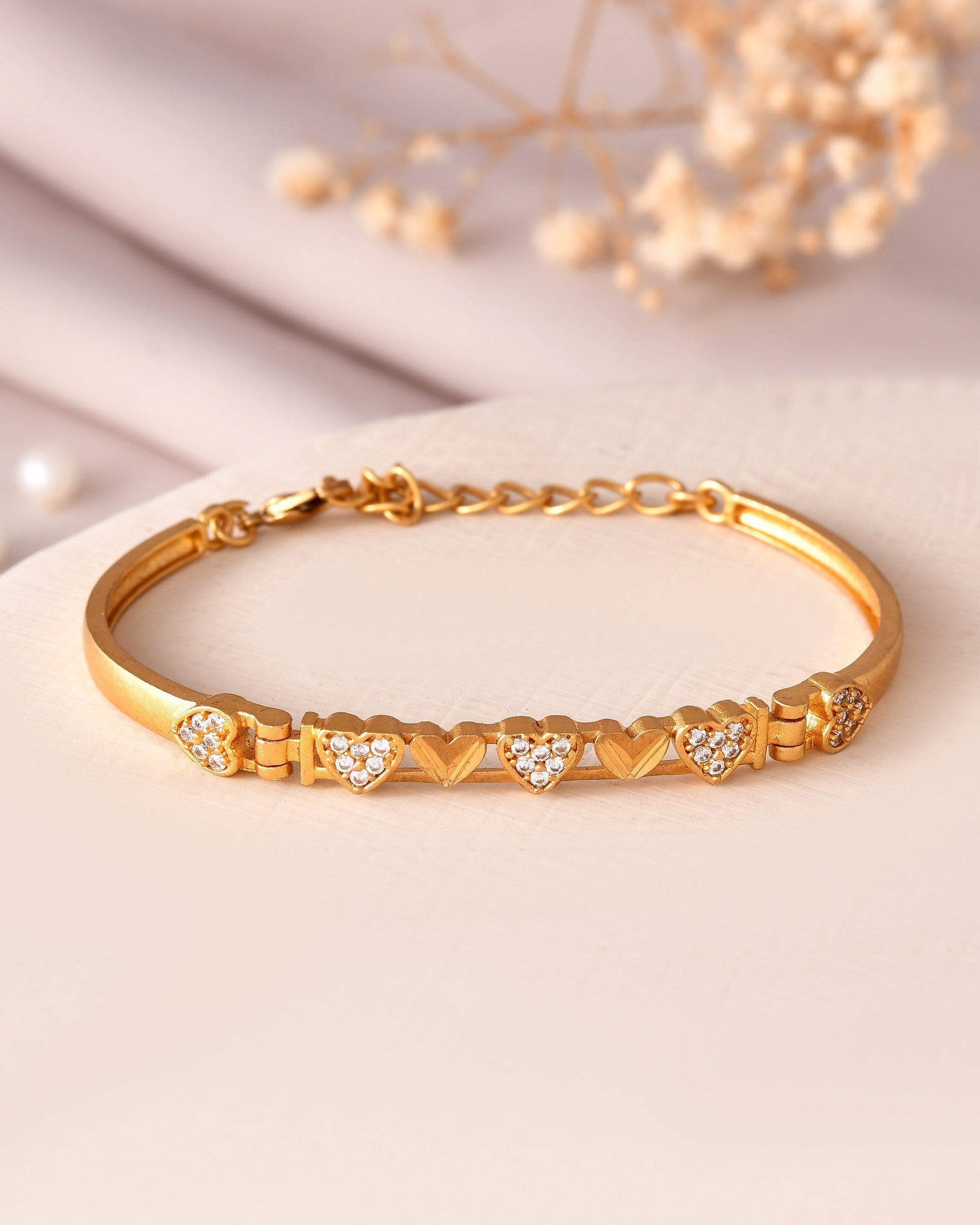 VOJ Women Gold Polished Heart Shaped Stone Studded Link Bracelet 