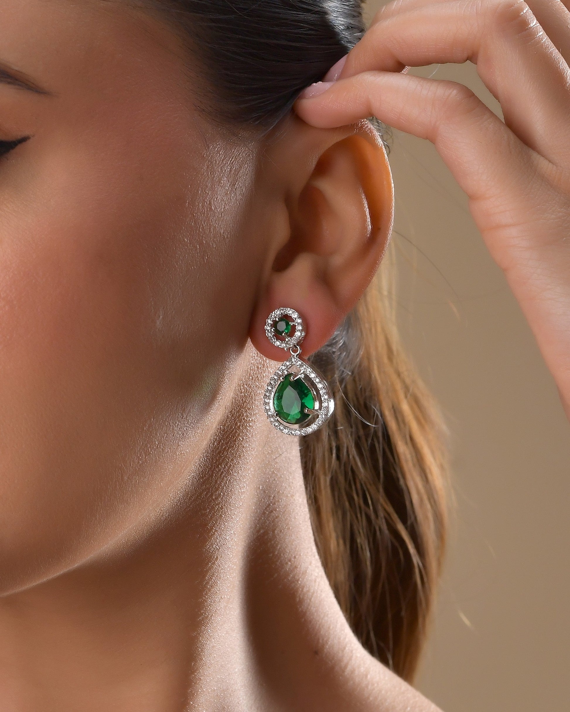 VOJ Silver Plated Green Stone Studded Teardrop Shaped Earrings 