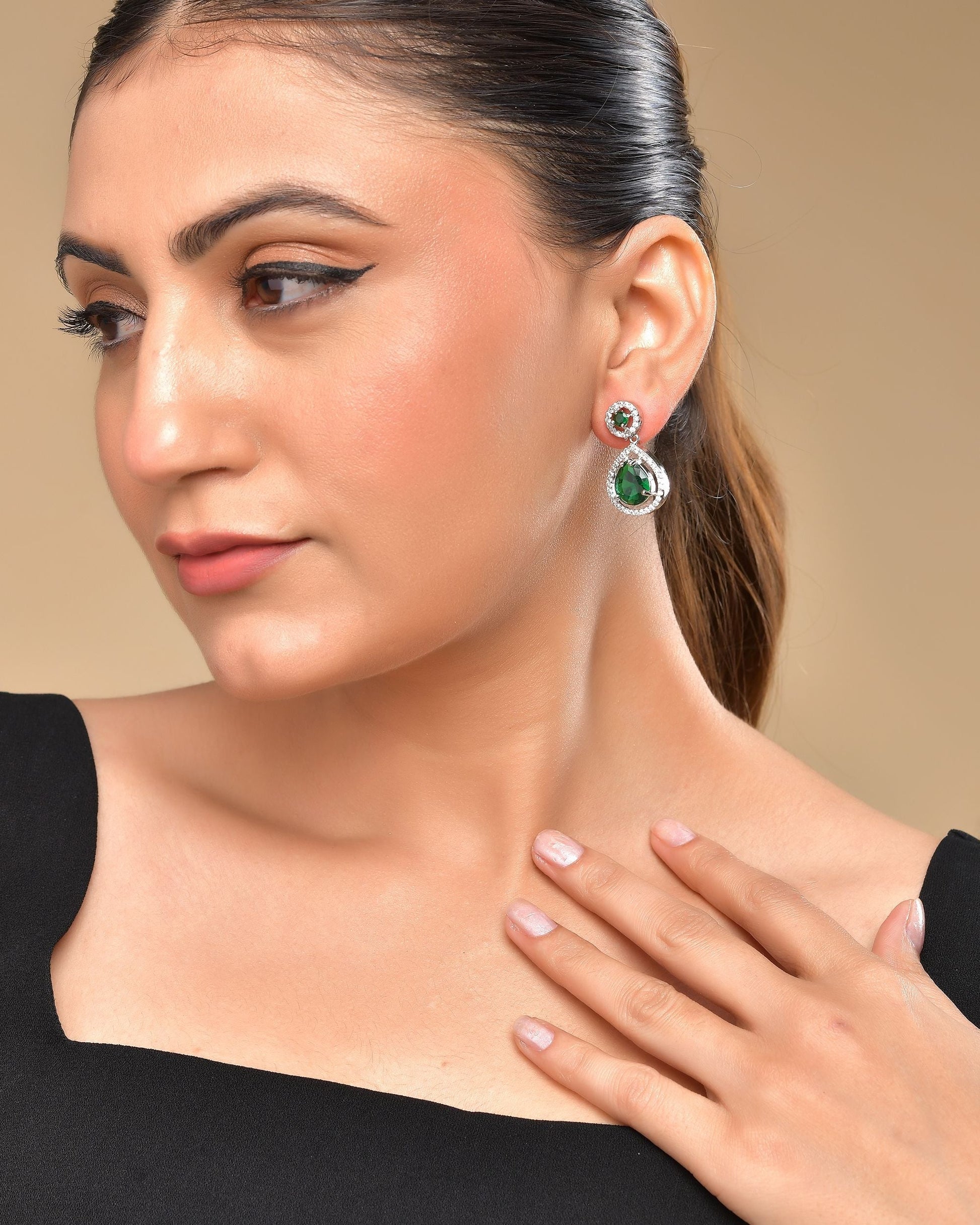 VOJ Silver Plated Green Stone Studded Teardrop Shaped Earrings 