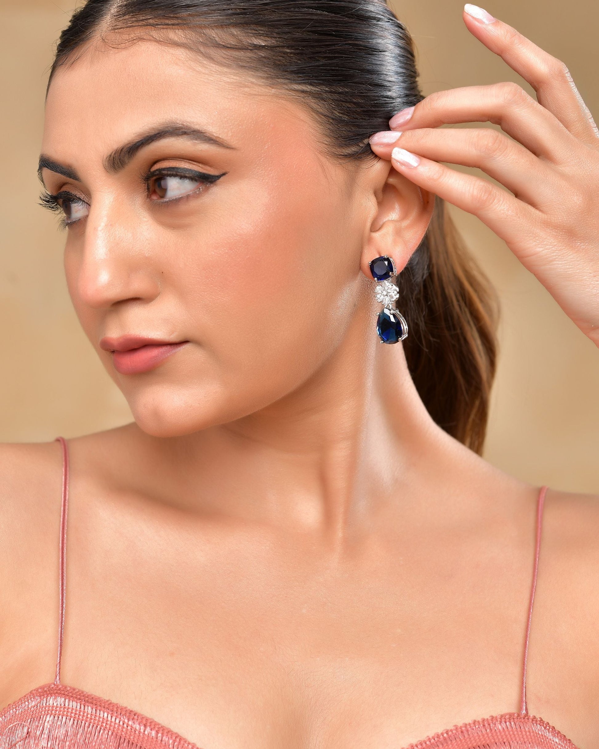 VOJ Silver Plated Blue Stone Studded Floral Shaped Studs Earrings 
