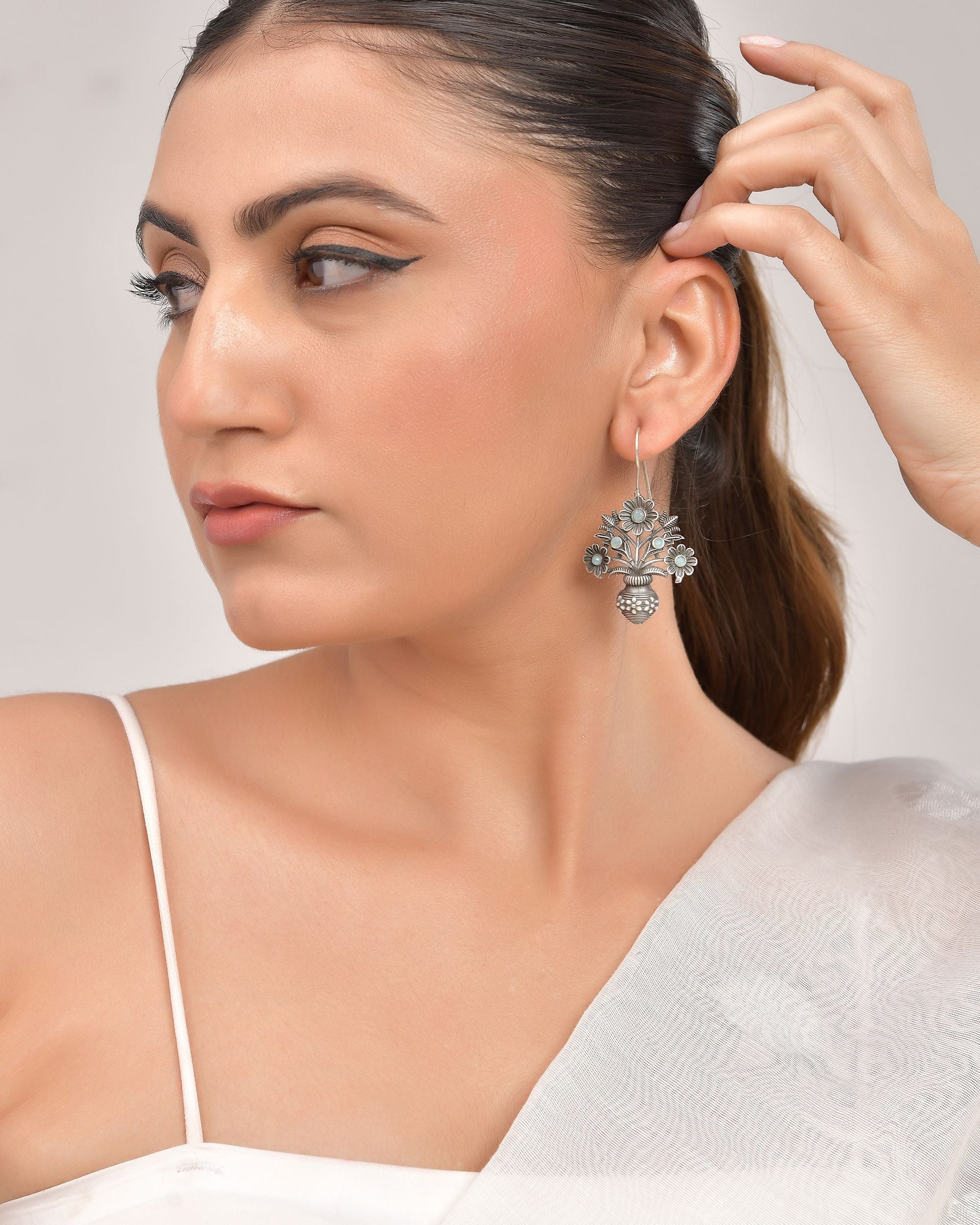 VOJ Silver Plated Floral Shaped Oxidized Drop Earrings 