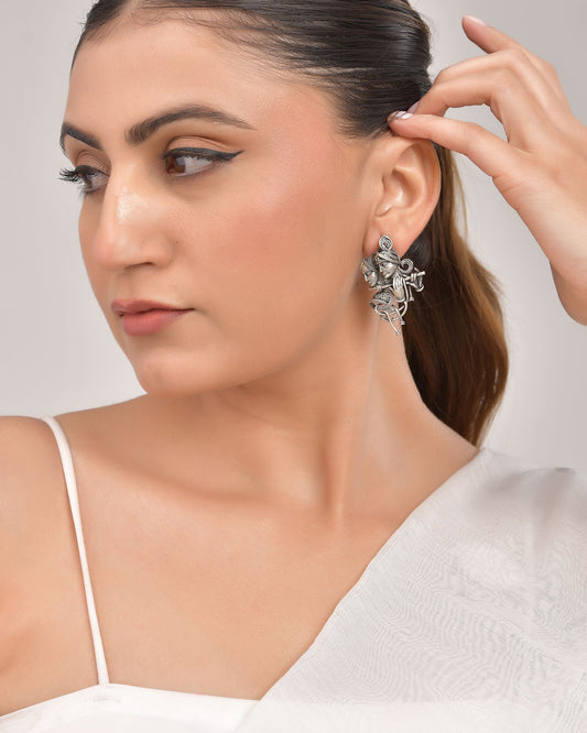 VOJ Silver Plated Oxidized Kanha Shaped Earrings 