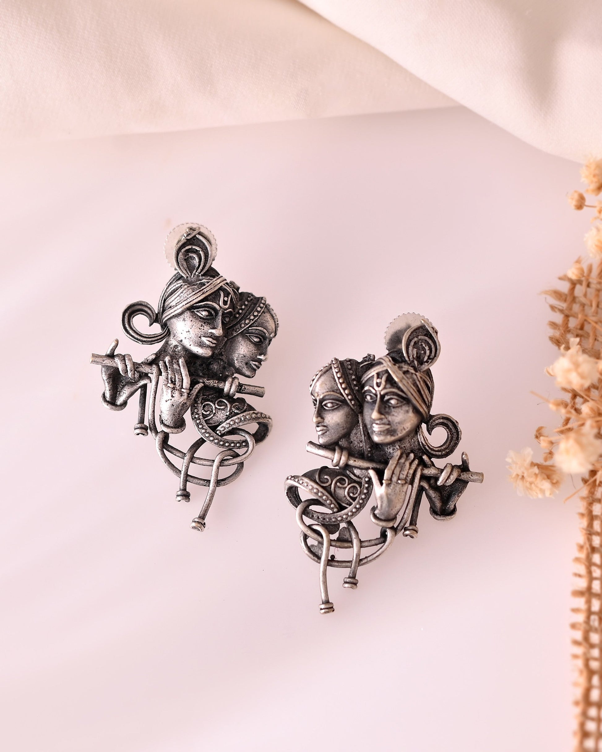 VOJ Silver Plated Oxidized Kanha Shaped Earrings 