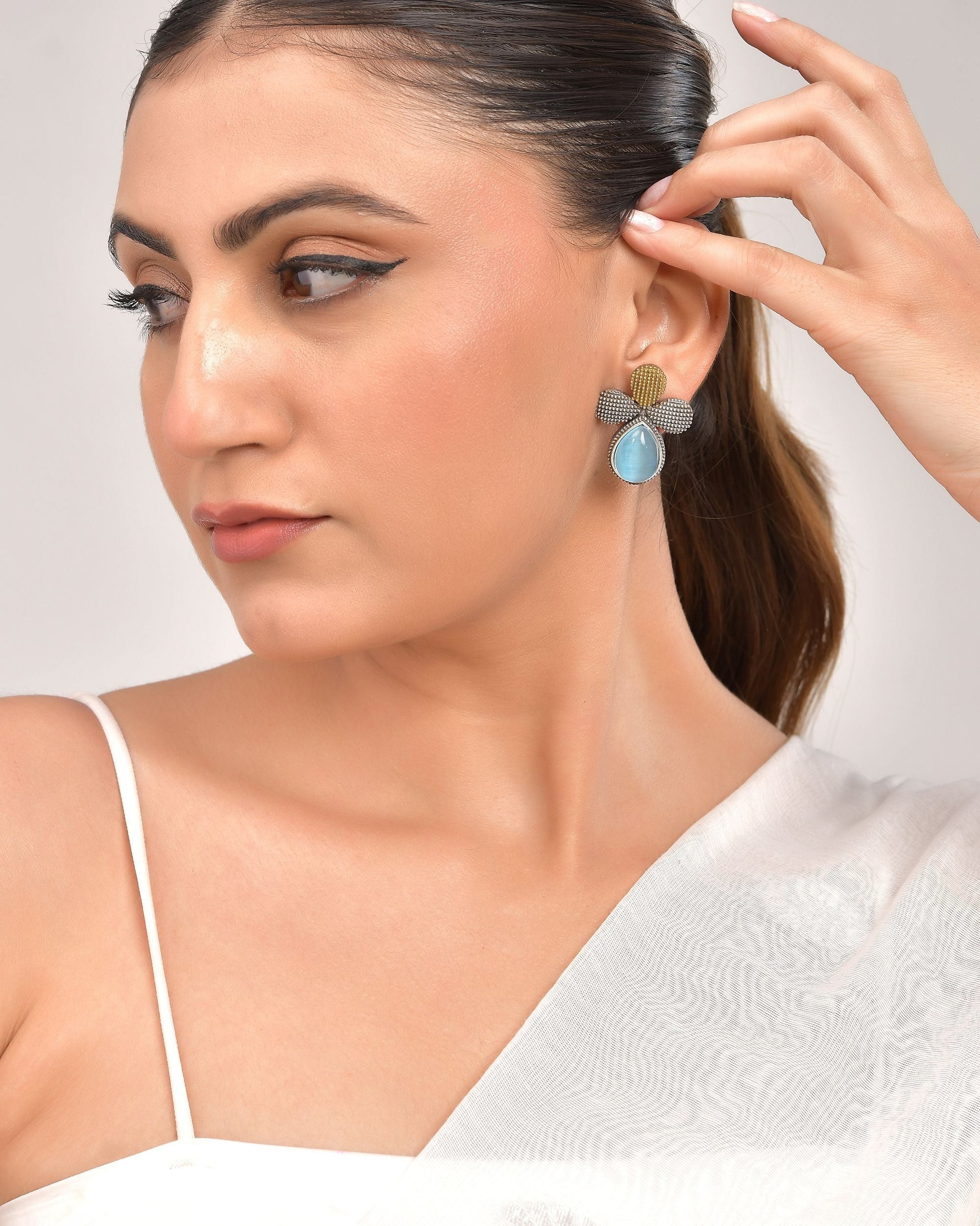 VOJ Silver Toned Blue Stone Studded Elegant Earrings 