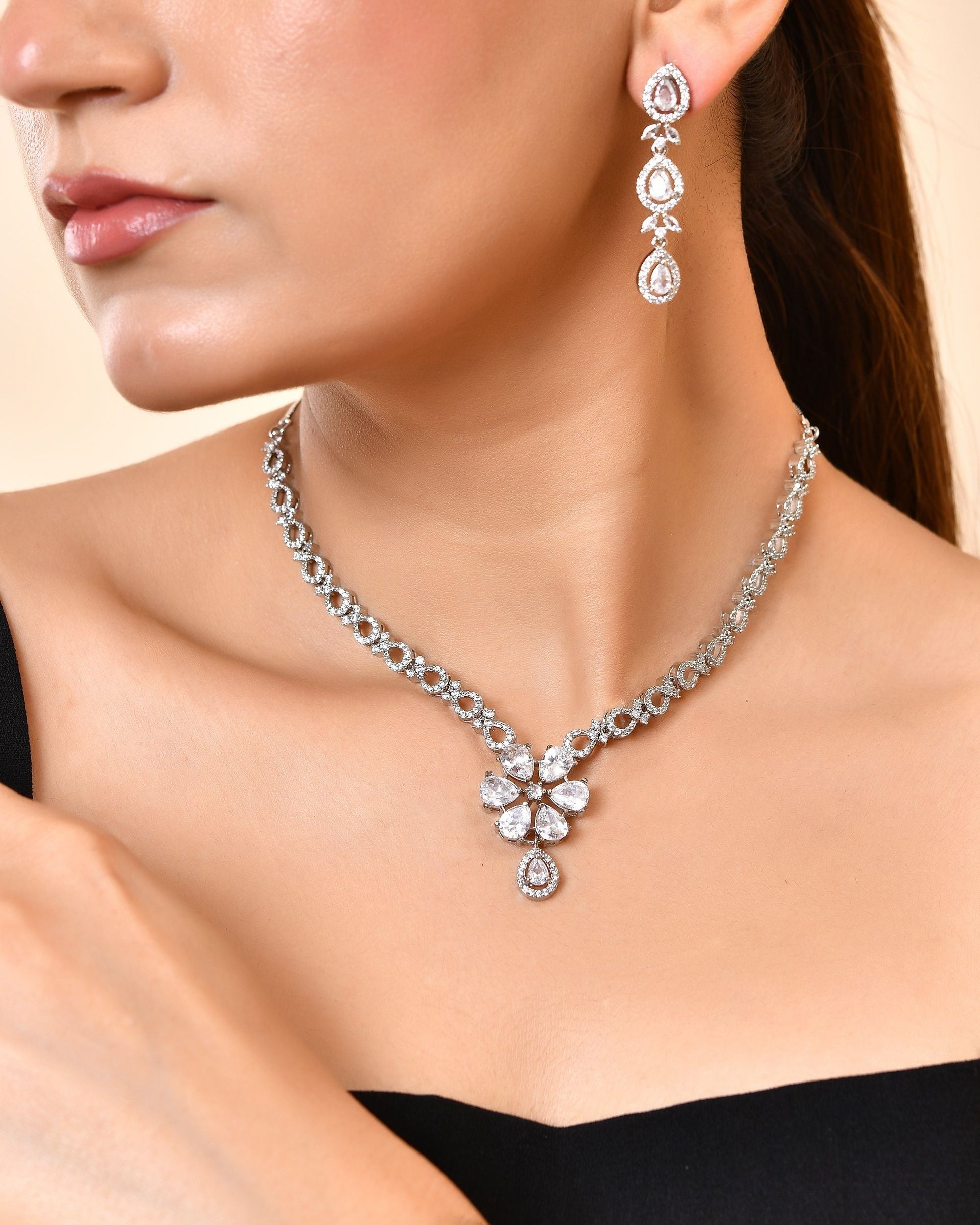 VOJ Silver Plated Ad Stone Studded Floral Jewellery Set  Grab2Buy VOJ Grab2Buy