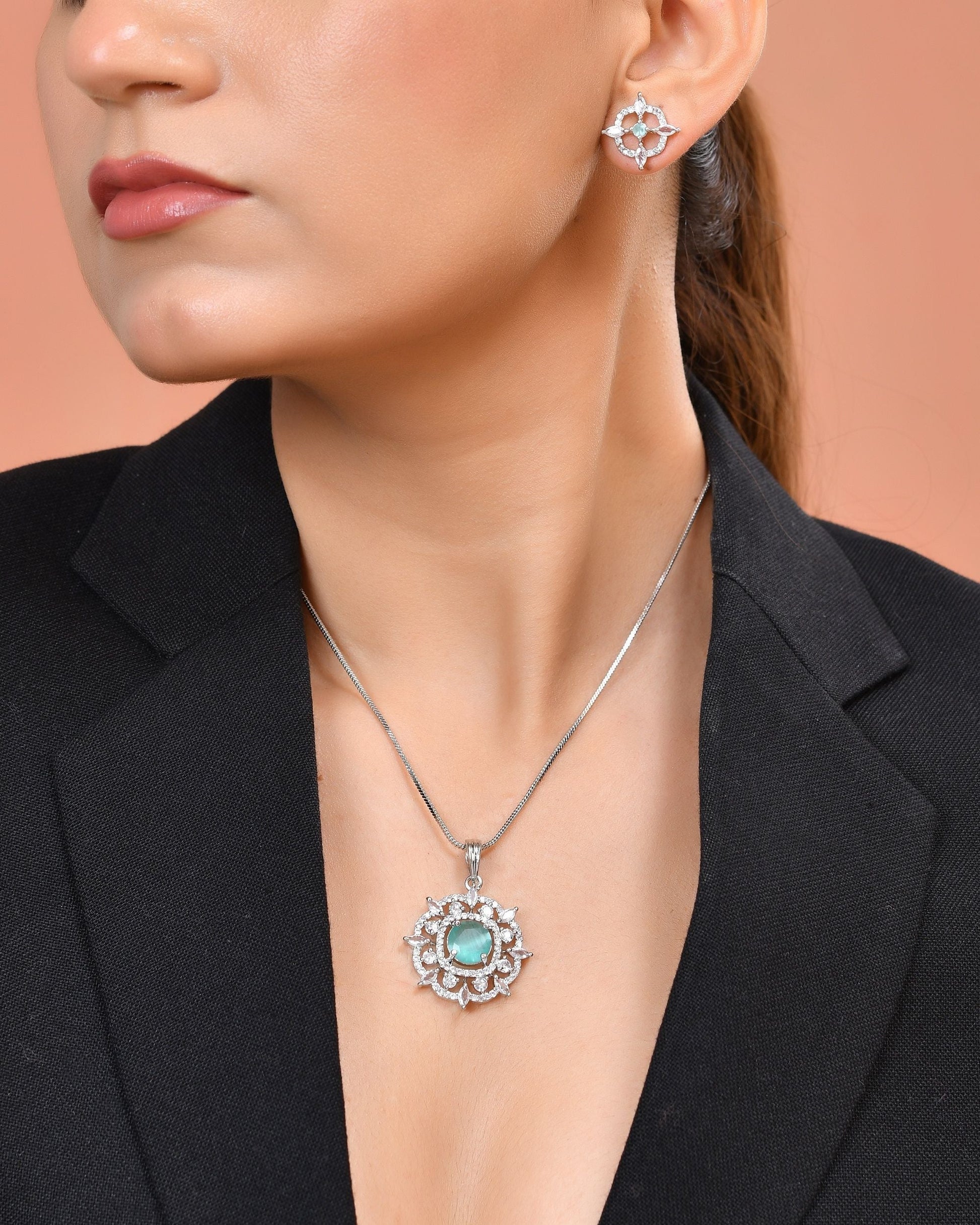 VOJ Silver Plated Sea Green Circulare Stone Studded Sun Shaped Ad Pendant With Chain Set  Grab2Buy VOJ Grab2Buy
