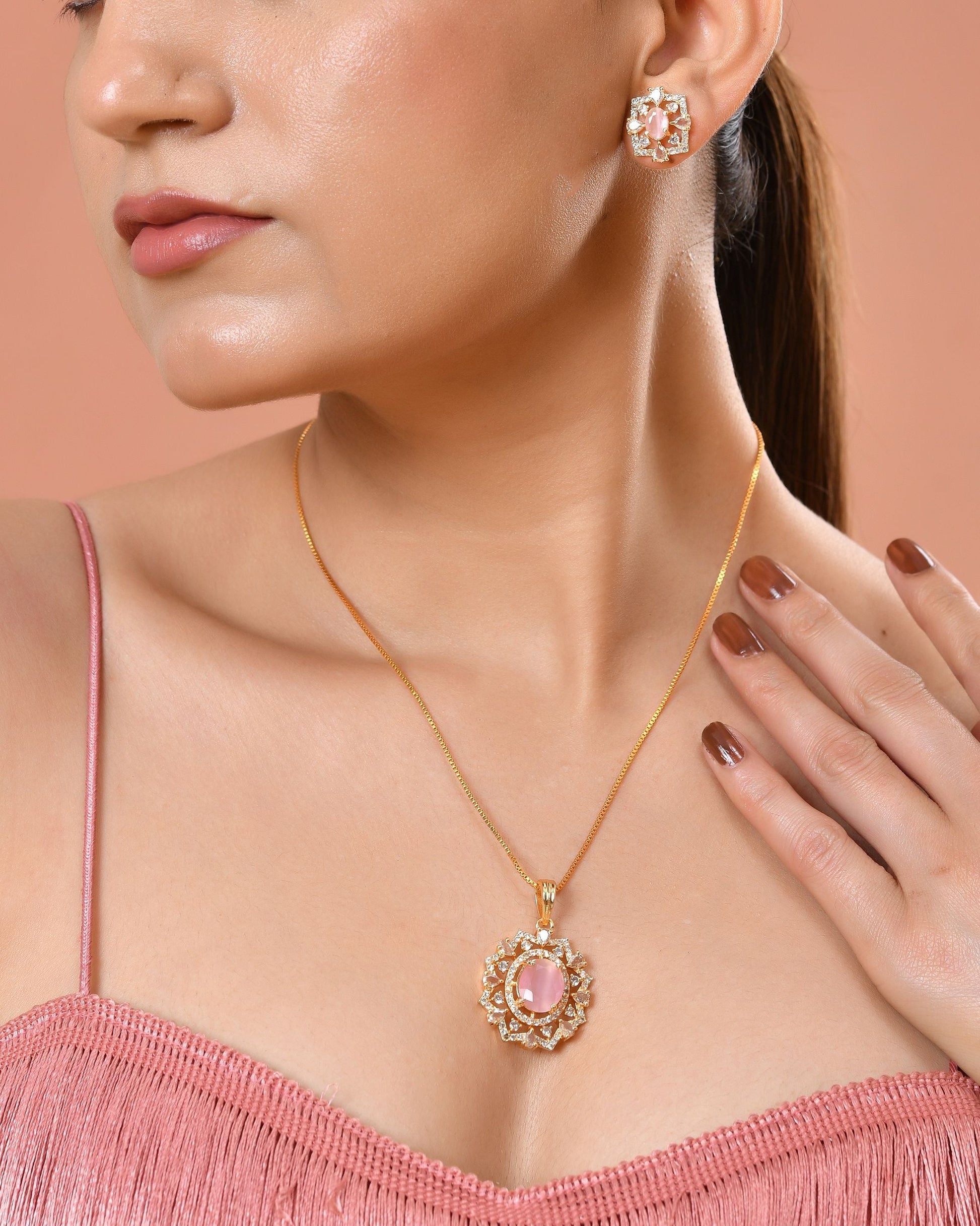VOJ Gold Toned Baby Pink Oval Stone Studded Sun Shaped Ad Pendant With Chain Set  Grab2Buy VOJ Grab2Buy
