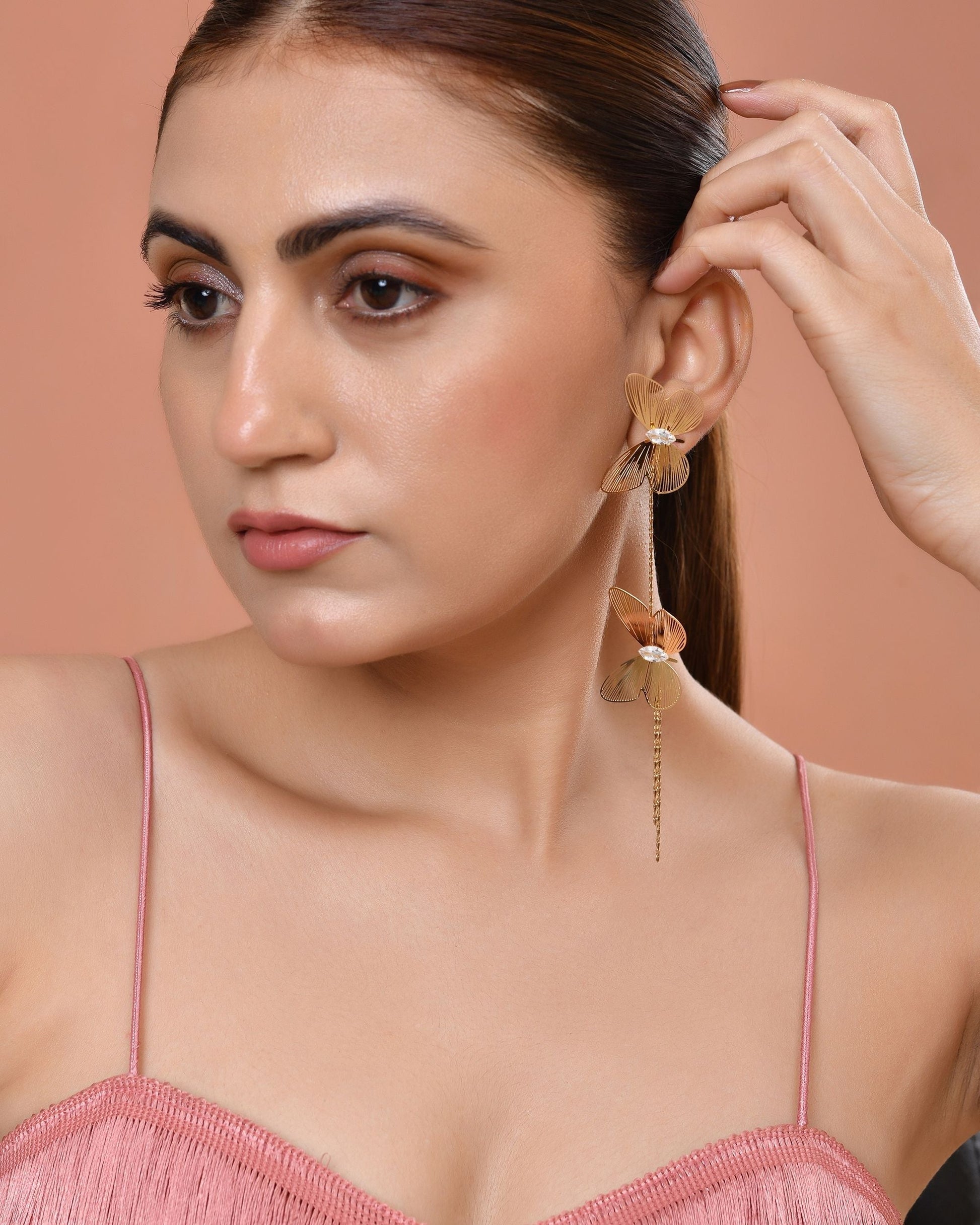 VOJ Gold Toned Butterfly Design With Tassel Studs Earrings  Grab2Buy VOJ Grab2Buy